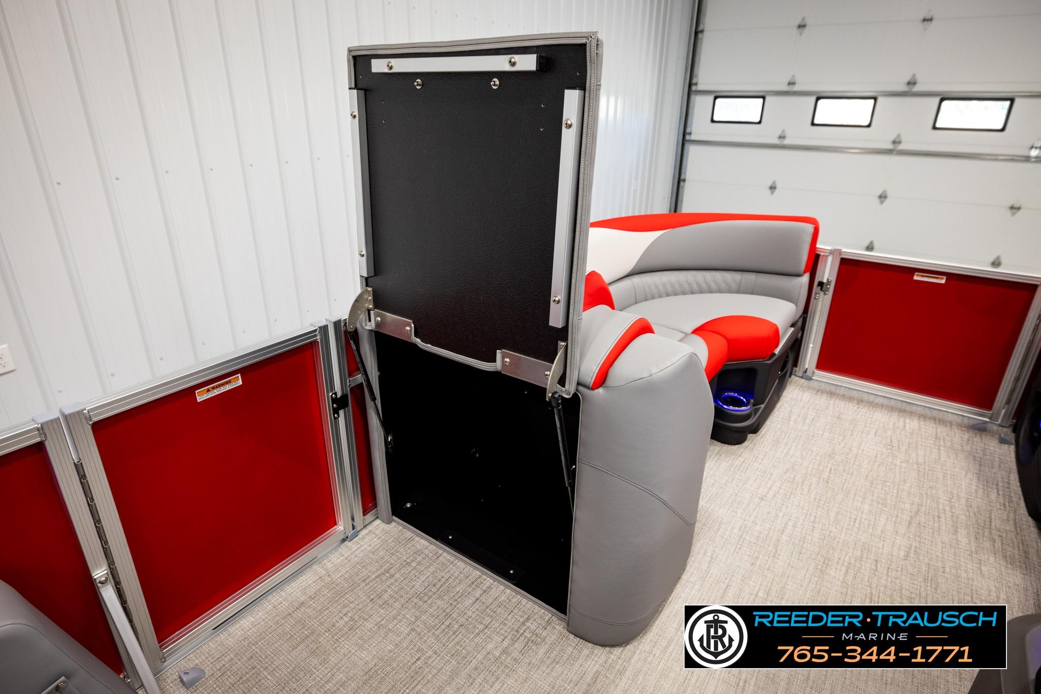 Interior of 2026 Avalon LSZ QL pontoon boat with red and gray seating.