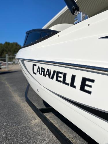 2019 Caravelle 19 EBo Bowrider boat side view with logo.