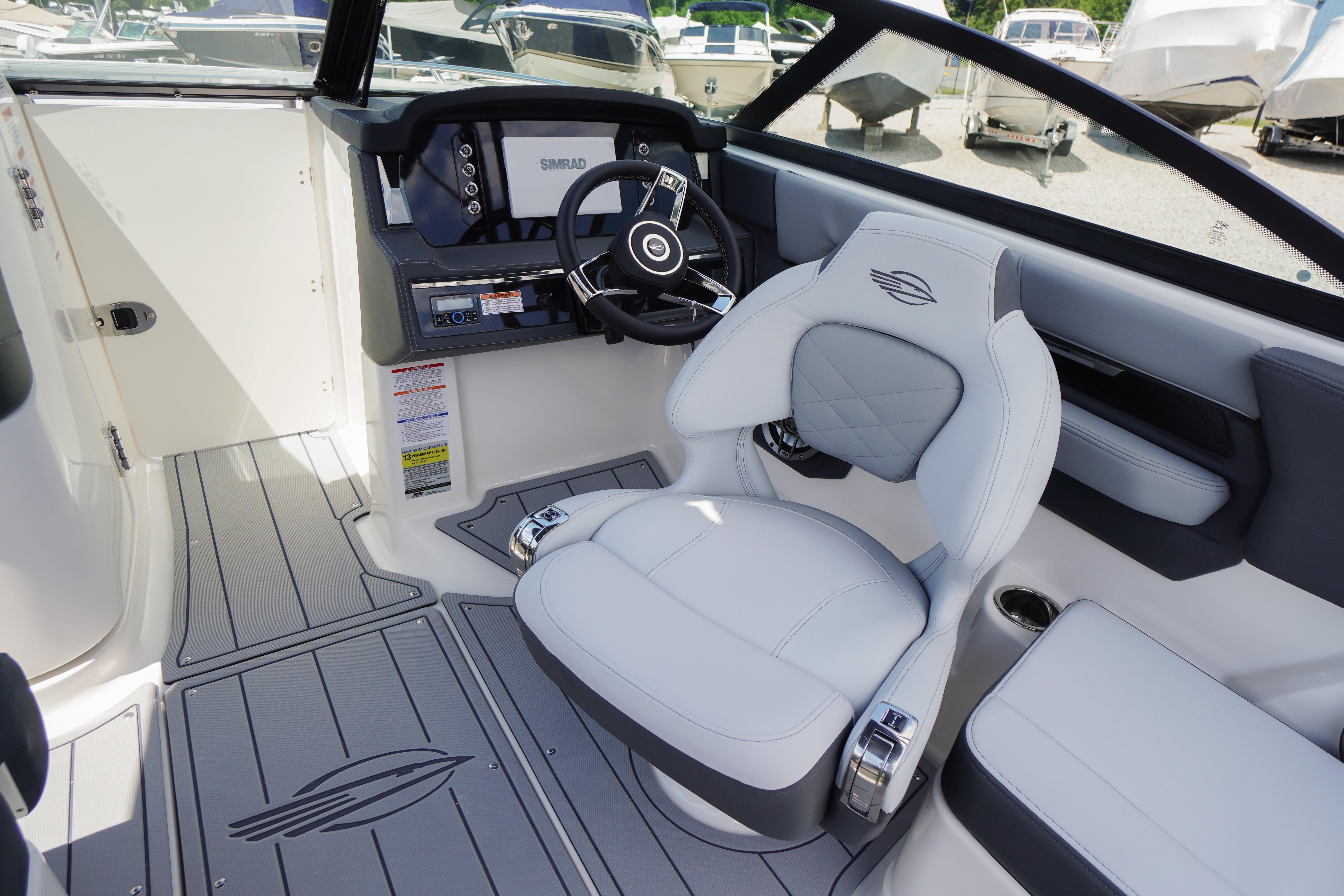 2026 Chaparral SSX 4 boat interior with modern dashboard and luxurious seating.