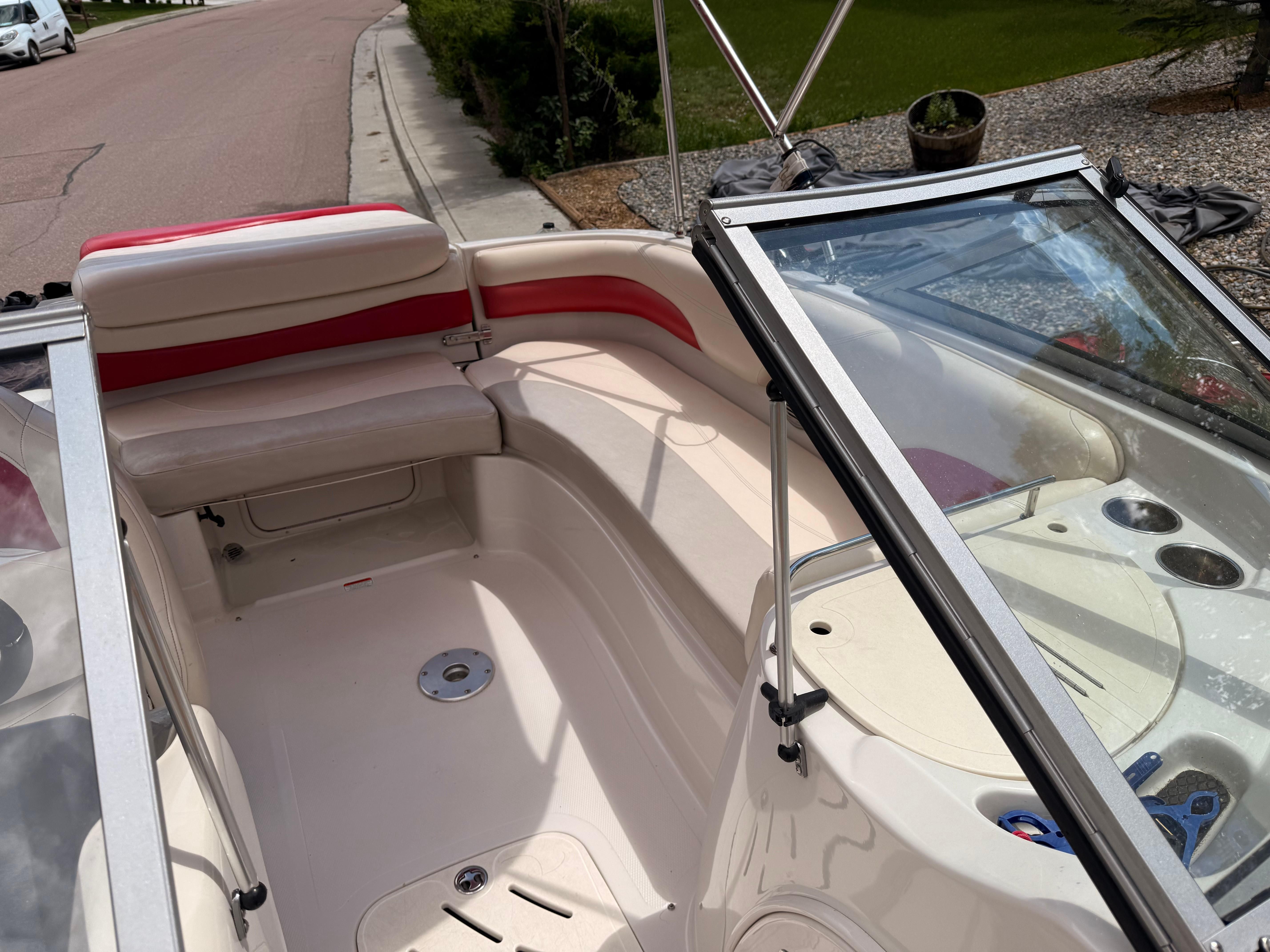 Interior of a 2011 Tahoe 216 WT boat with seating area.