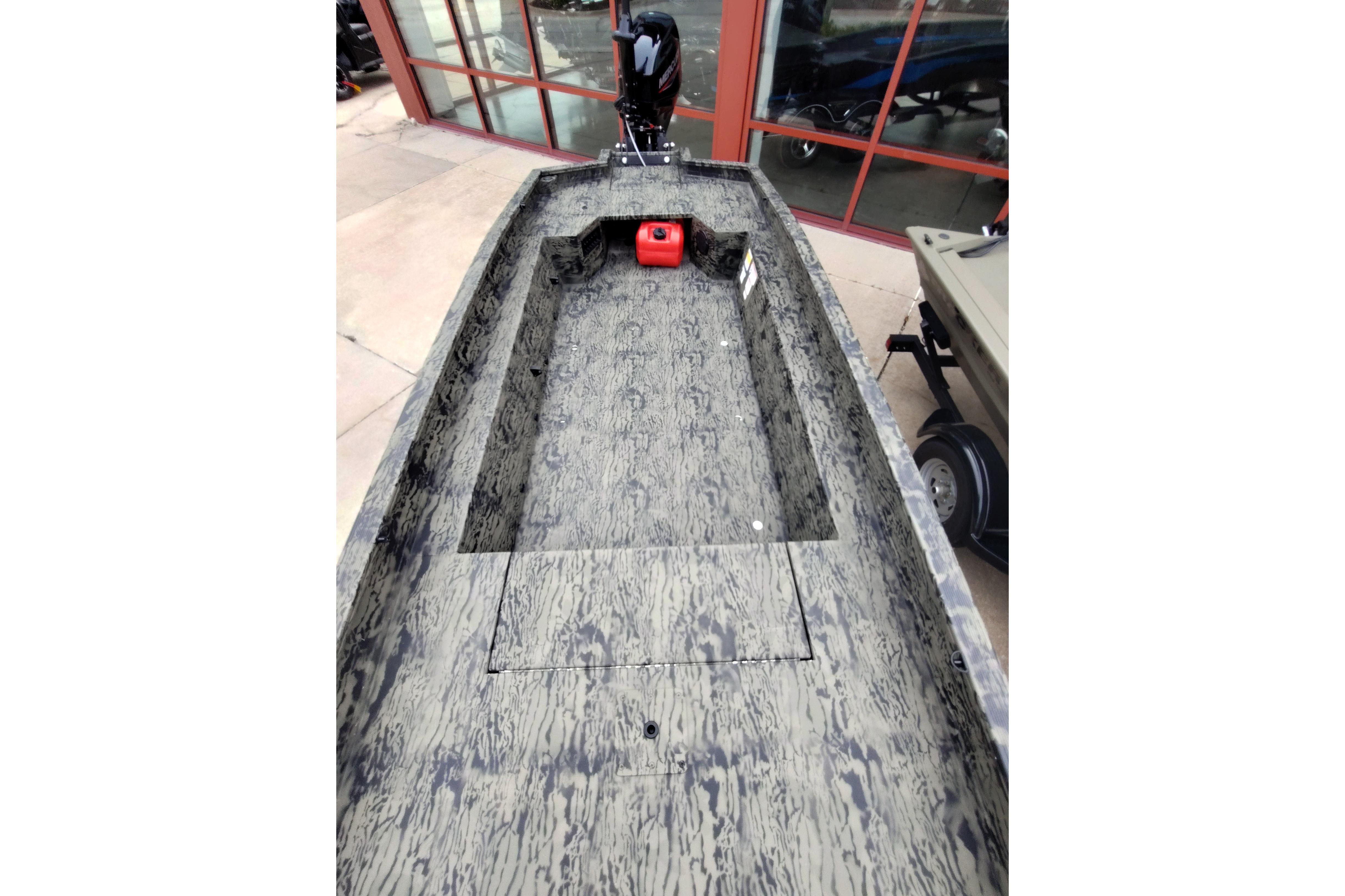 2026 Tracker Grizzly 1650 T Prairie Wings Edition boat with camouflage interior design.