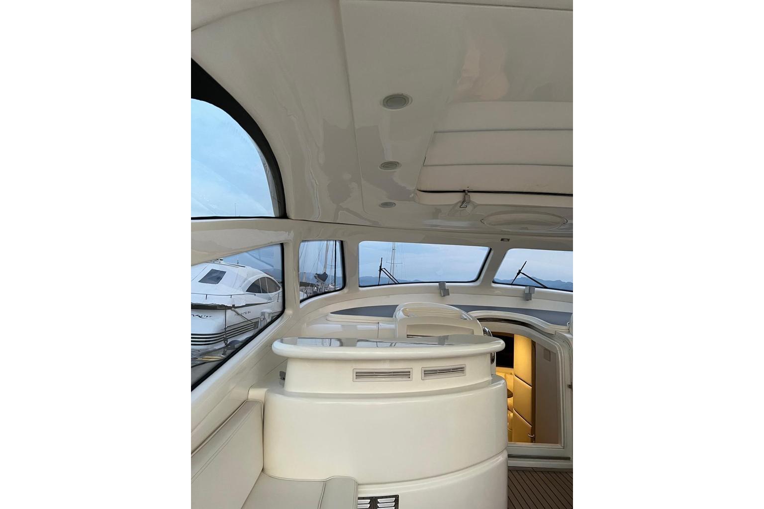Interior view of 2001 Baia Azzurra 63 yacht, featuring sleek design and modern amenities.
