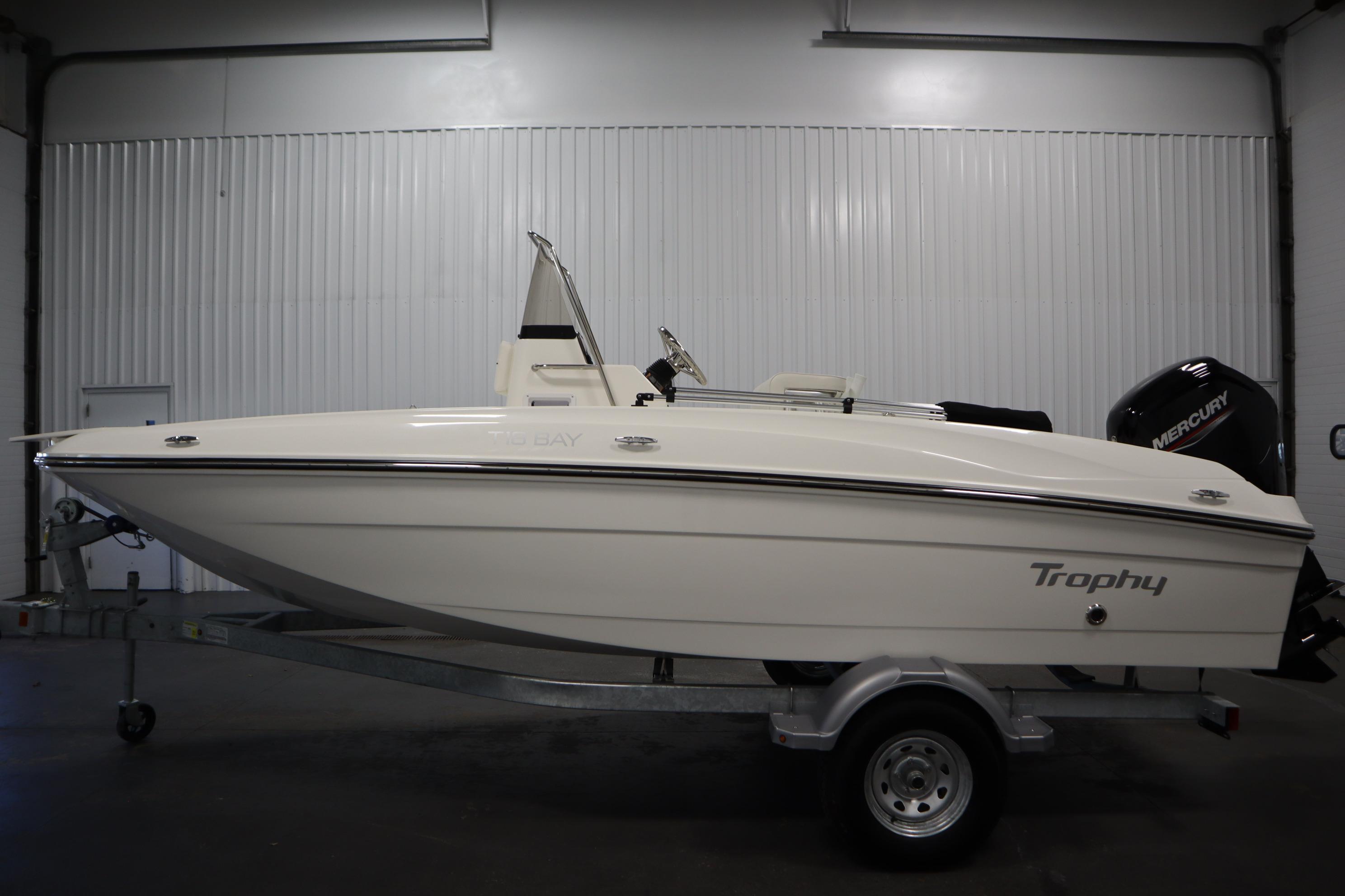 2026 Bayliner Trophy T18 boat on trailer in indoor storage facility.