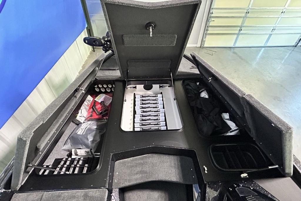 2026 Skeeter ZX200 boat interior with open storage compartments and organized equipment.