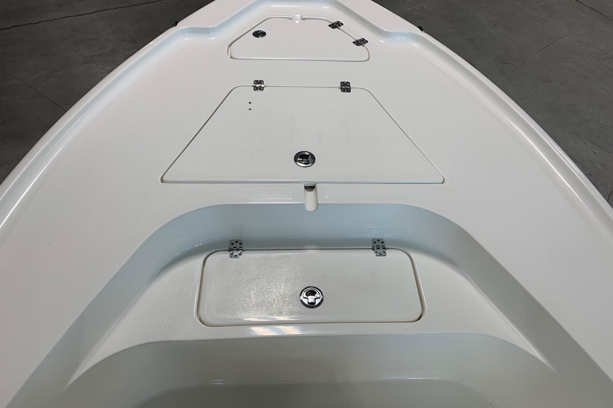2026 Key West 188 Bay Reef boat deck with storage compartments.