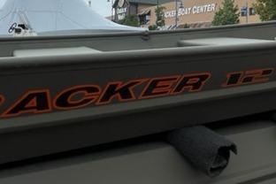 2026 Tracker Grizzly 12 Jon boat at a dealership.