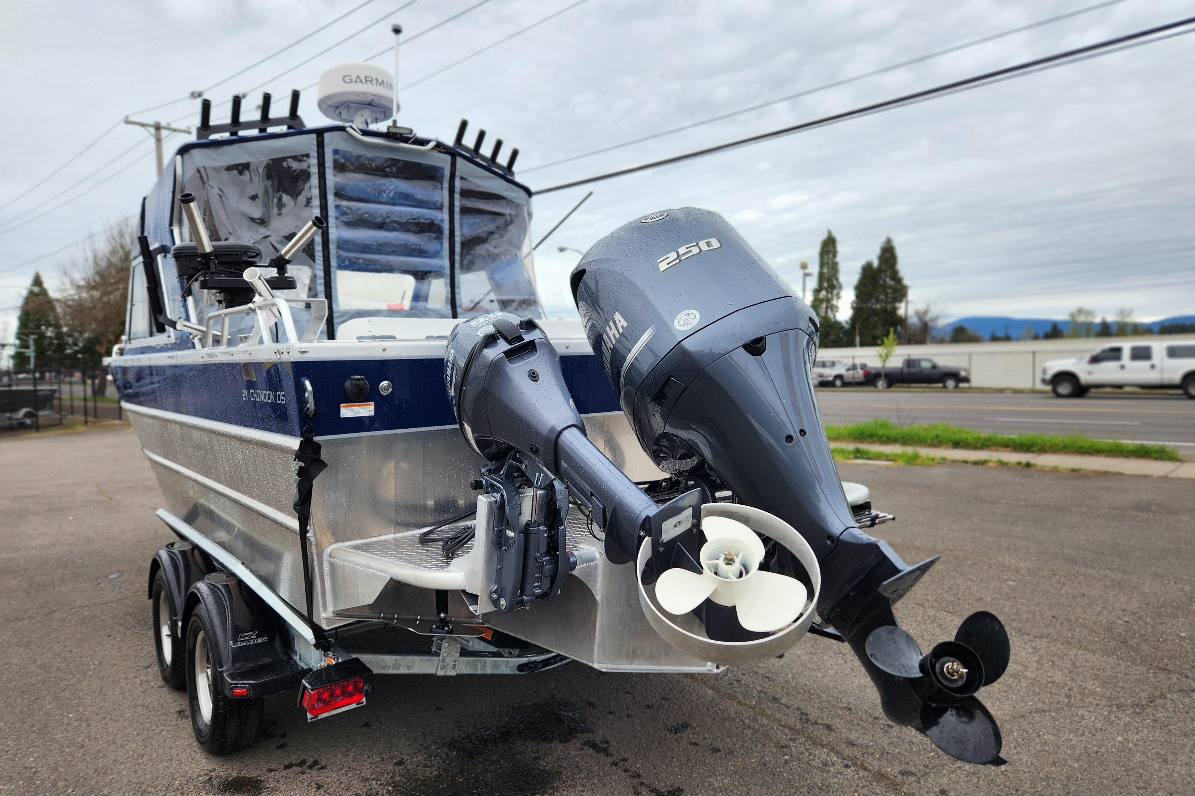 2025 Thunder Jet 21 Chinook OS boat with Yamaha 250 outboard motor, parked on trailer.