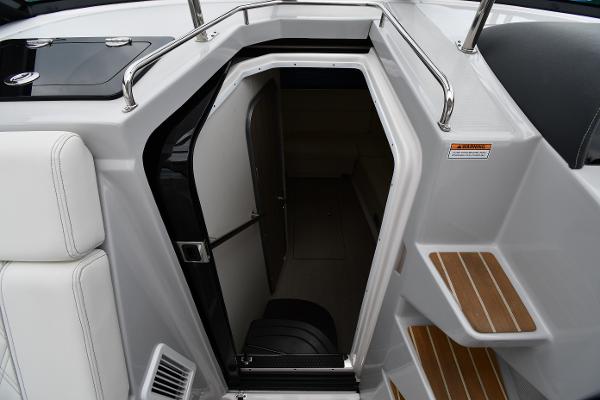 2021 Regal 35 Sport Coupe cabin entrance with sleek design and wooden steps.
