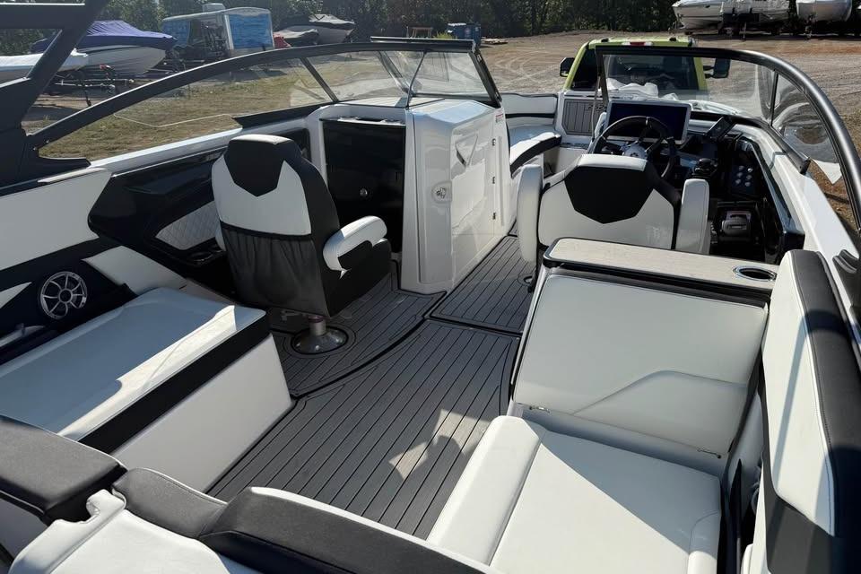 Interior of 2026 Yamaha Boats 252S, featuring sleek seating and modern dashboard design.