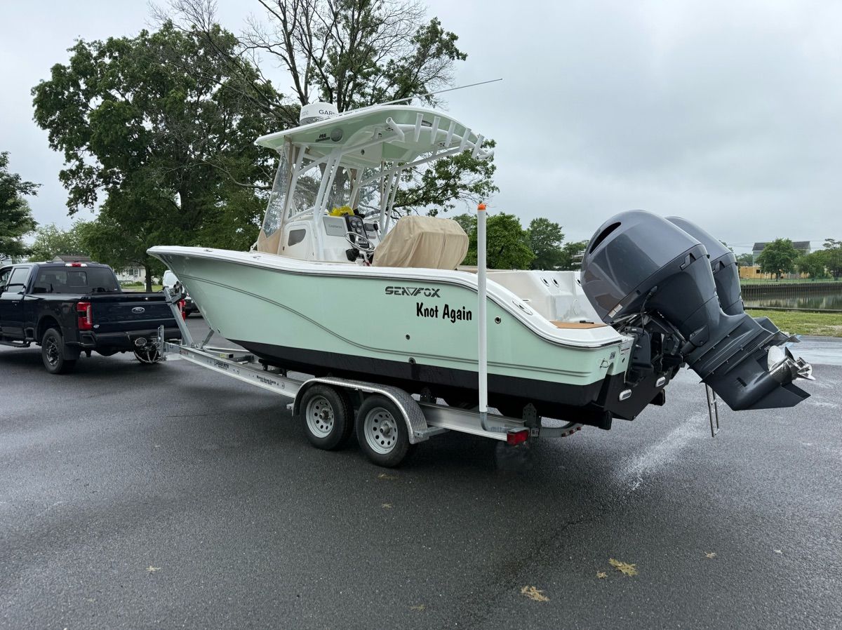 A 2017 Sea Fox Commander 266 boat on a trailer, ready for launch.