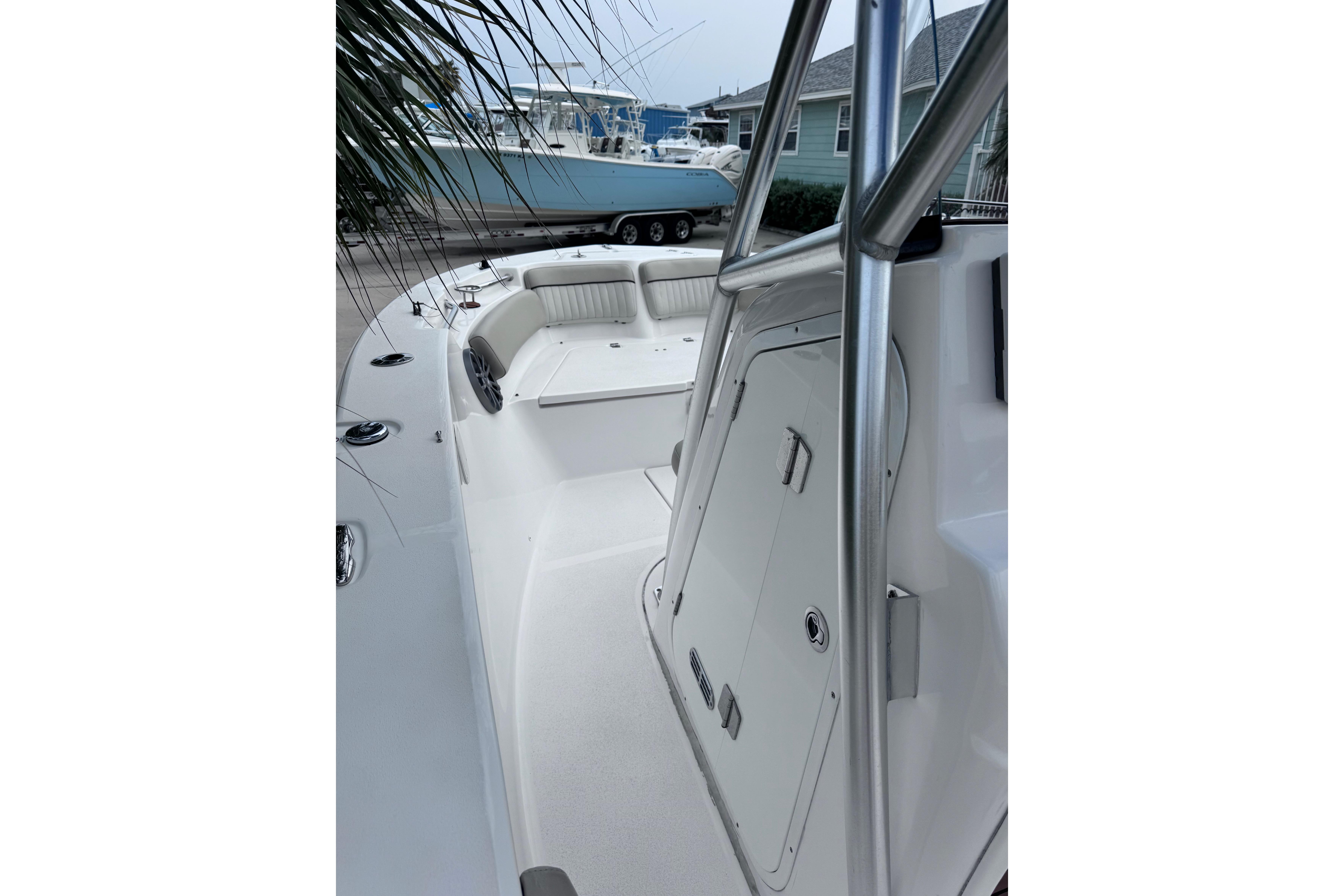 2018 Sea Fox 206 Commander boat interior with seating and storage compartments.