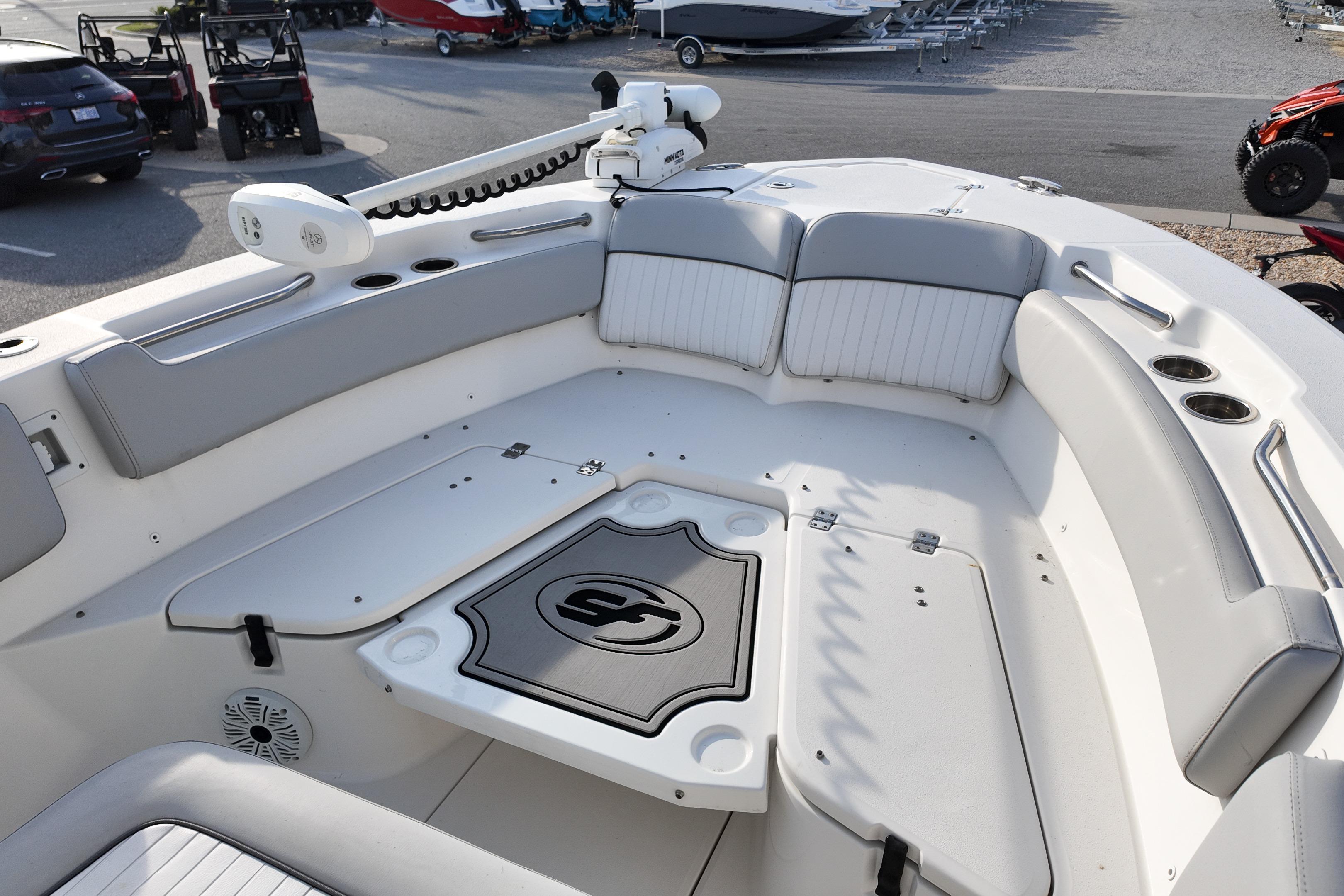 2019 Sea Fox 228 Commander boat interior with seating and storage compartments.