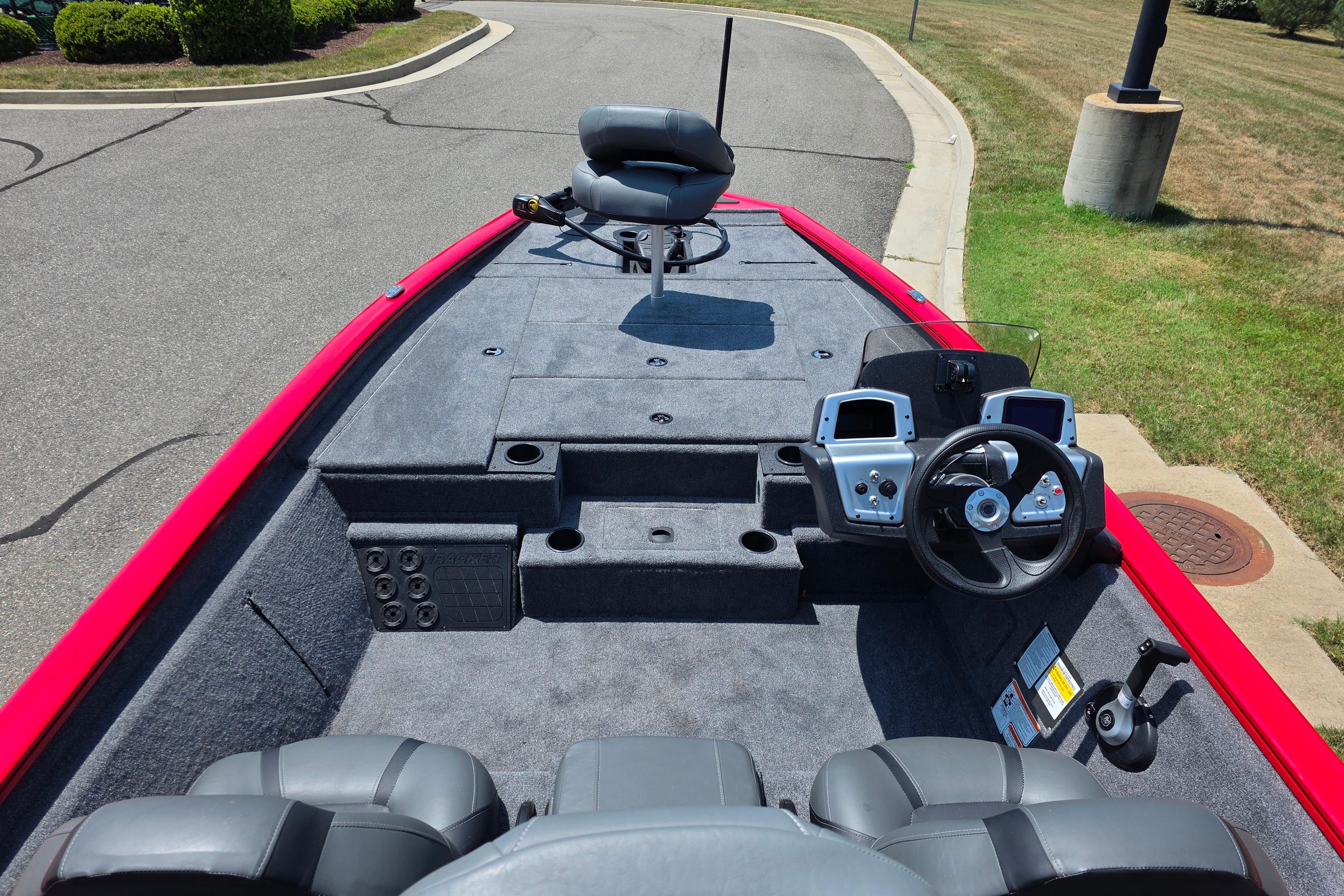 2026 Tracker Pro Team 195 boat interior with steering console and seating.