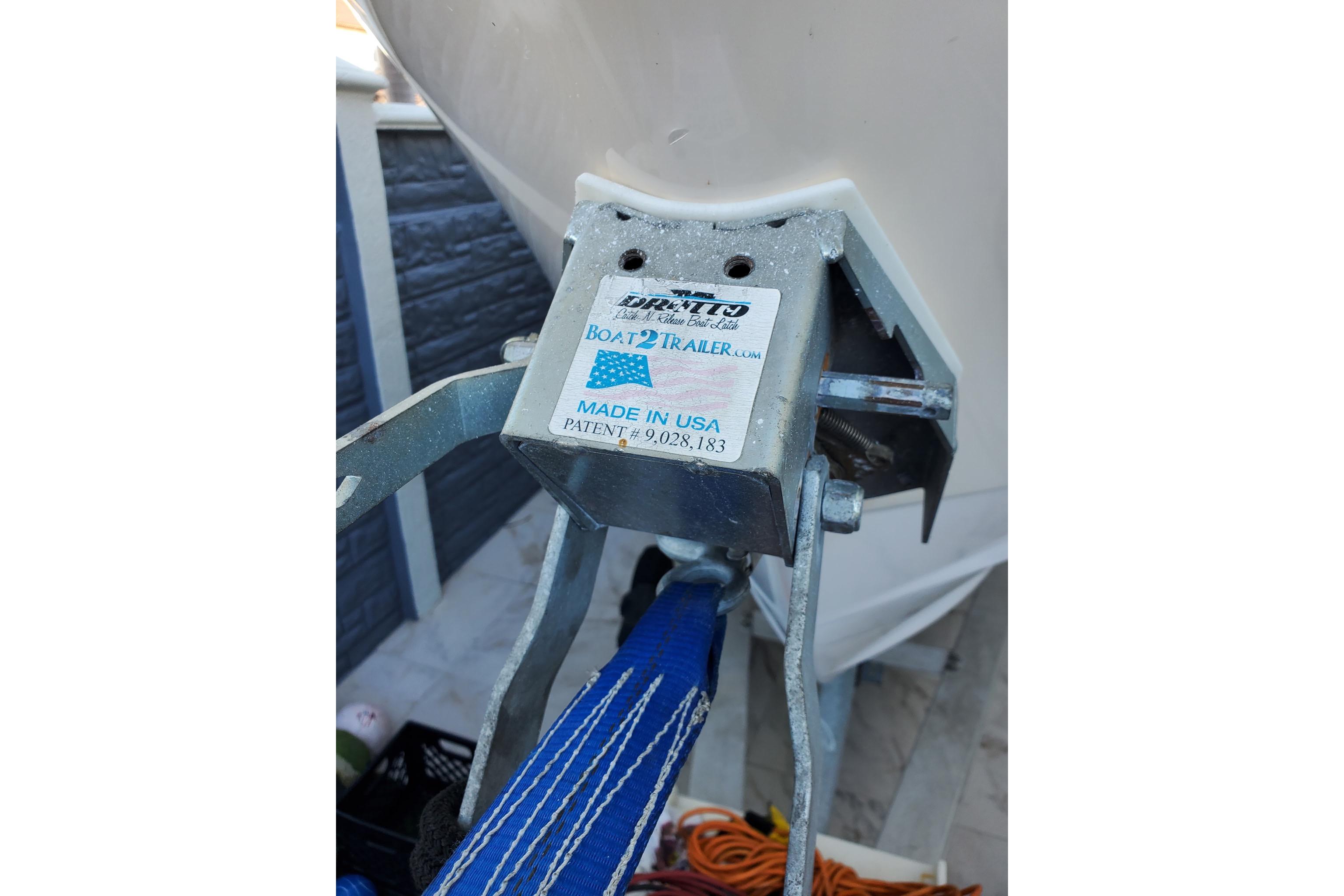 Close-up of a 2004 Grady-White Chase 273 boat trailer hitch with USA label.