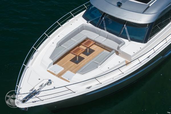 2025 Riviera 645 SUV luxury yacht with spacious deck seating.