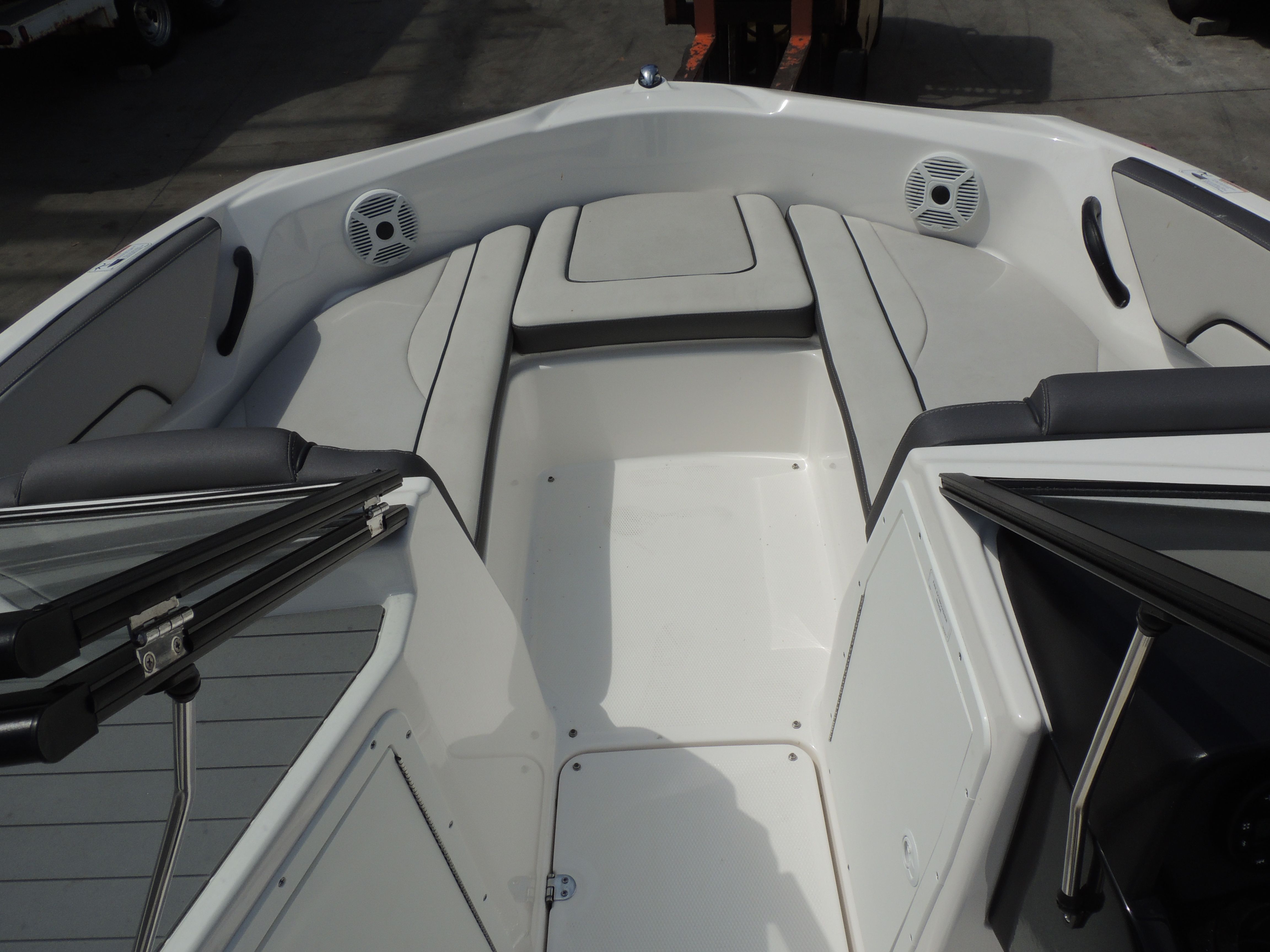 Interior of a 2023 Yamaha SX190 boat, white upholstery.