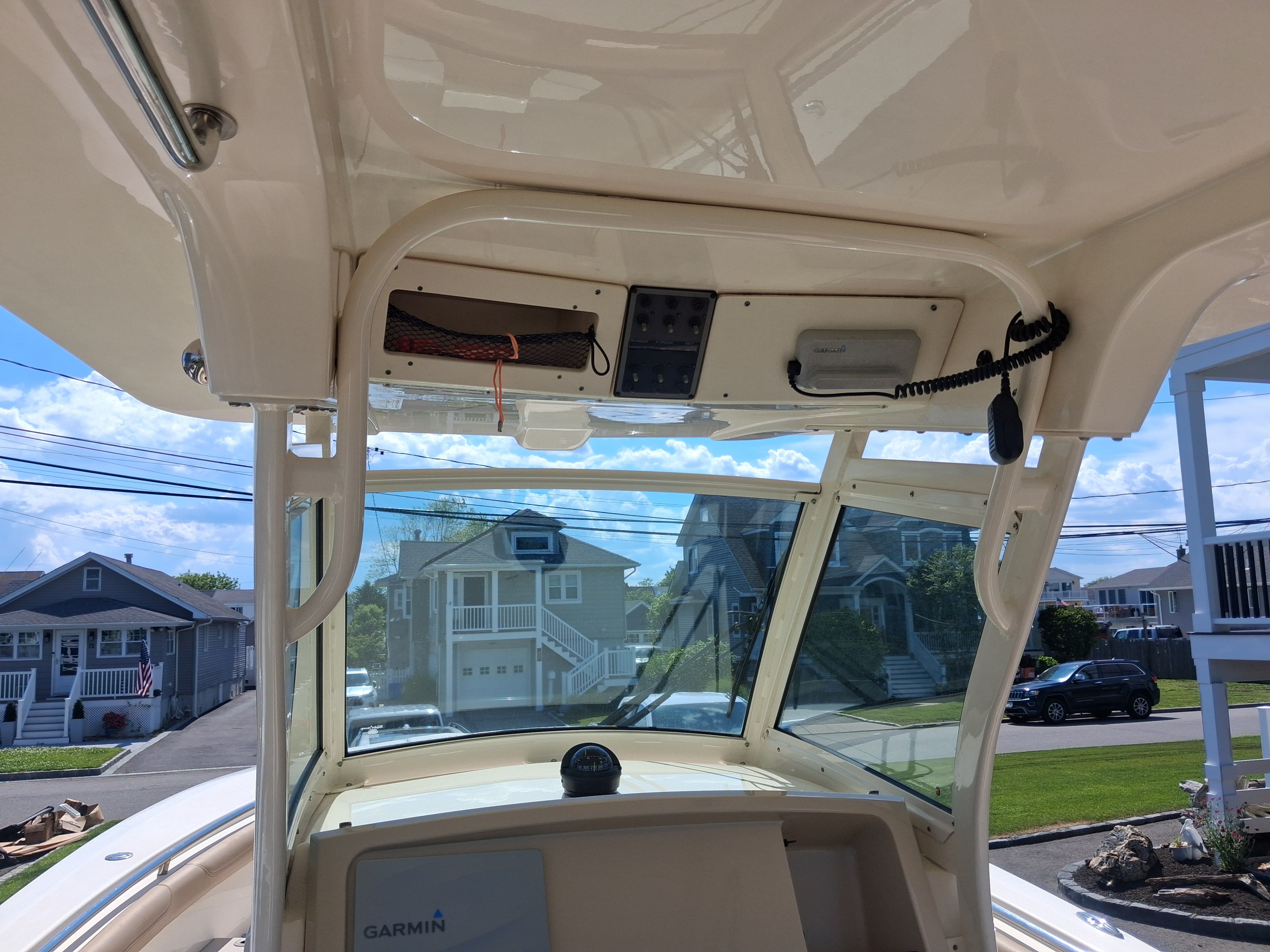 Interior view of a 2018 Scout 255LXF boat with Garmin equipment.