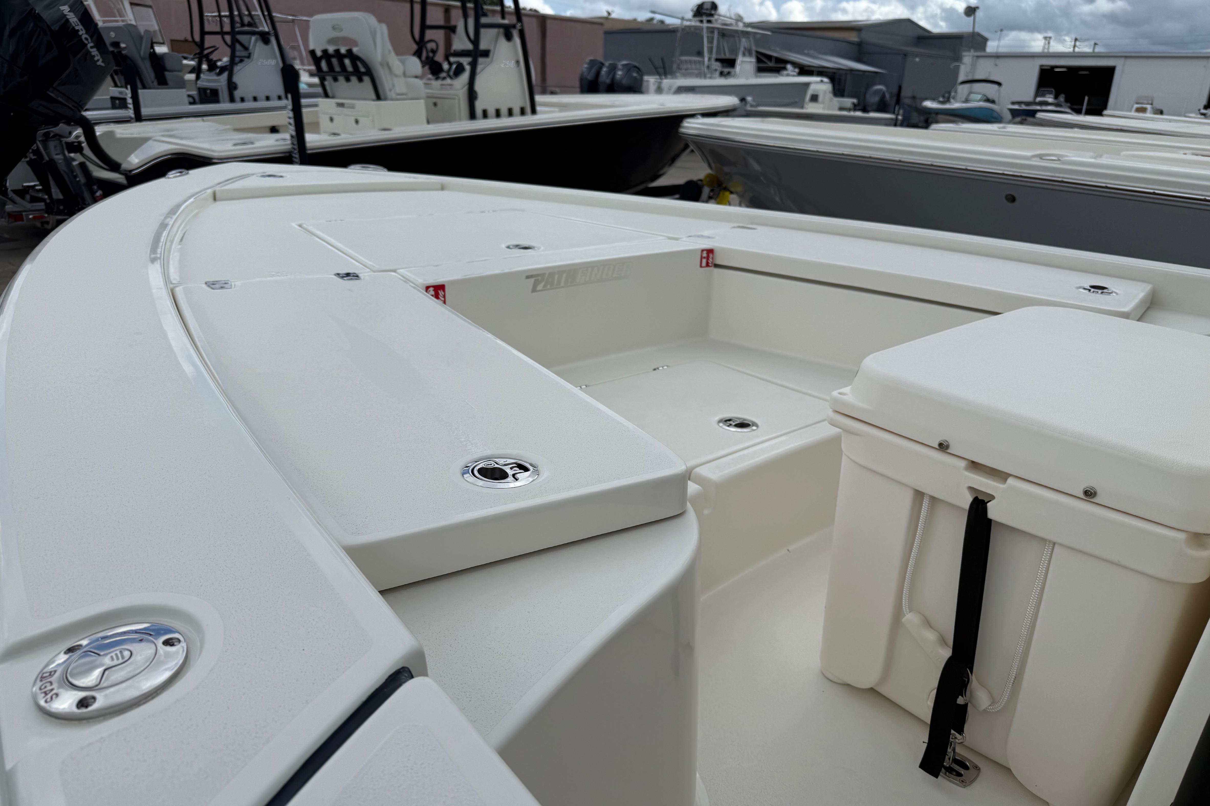 2026 Pathfinder 2300 HPS boat interior with seating and storage compartments.