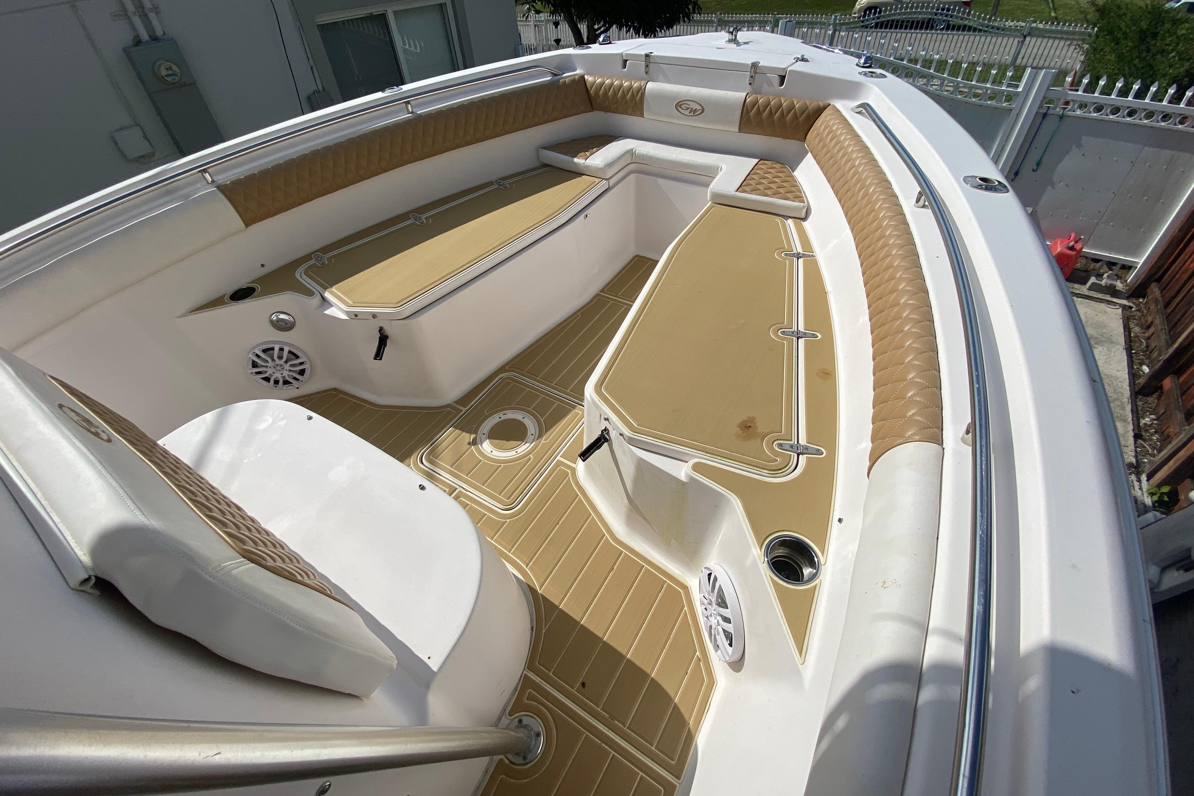 2004 Grady-White Canyon 283 boat interior with tan seating and white accents.