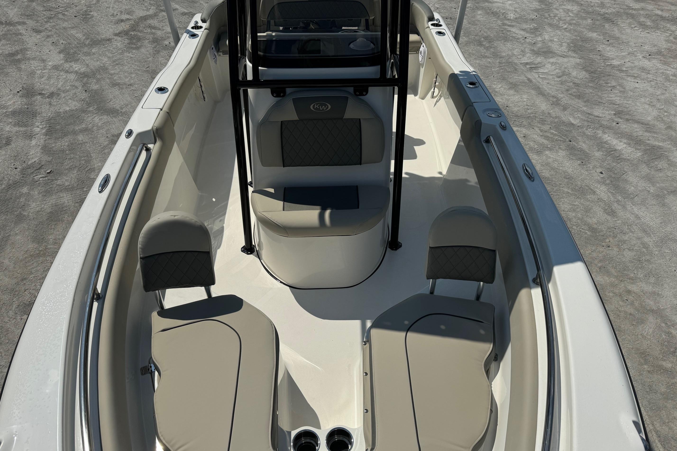 2025 Key West 203 FS boat interior with seating and console, viewed from above.