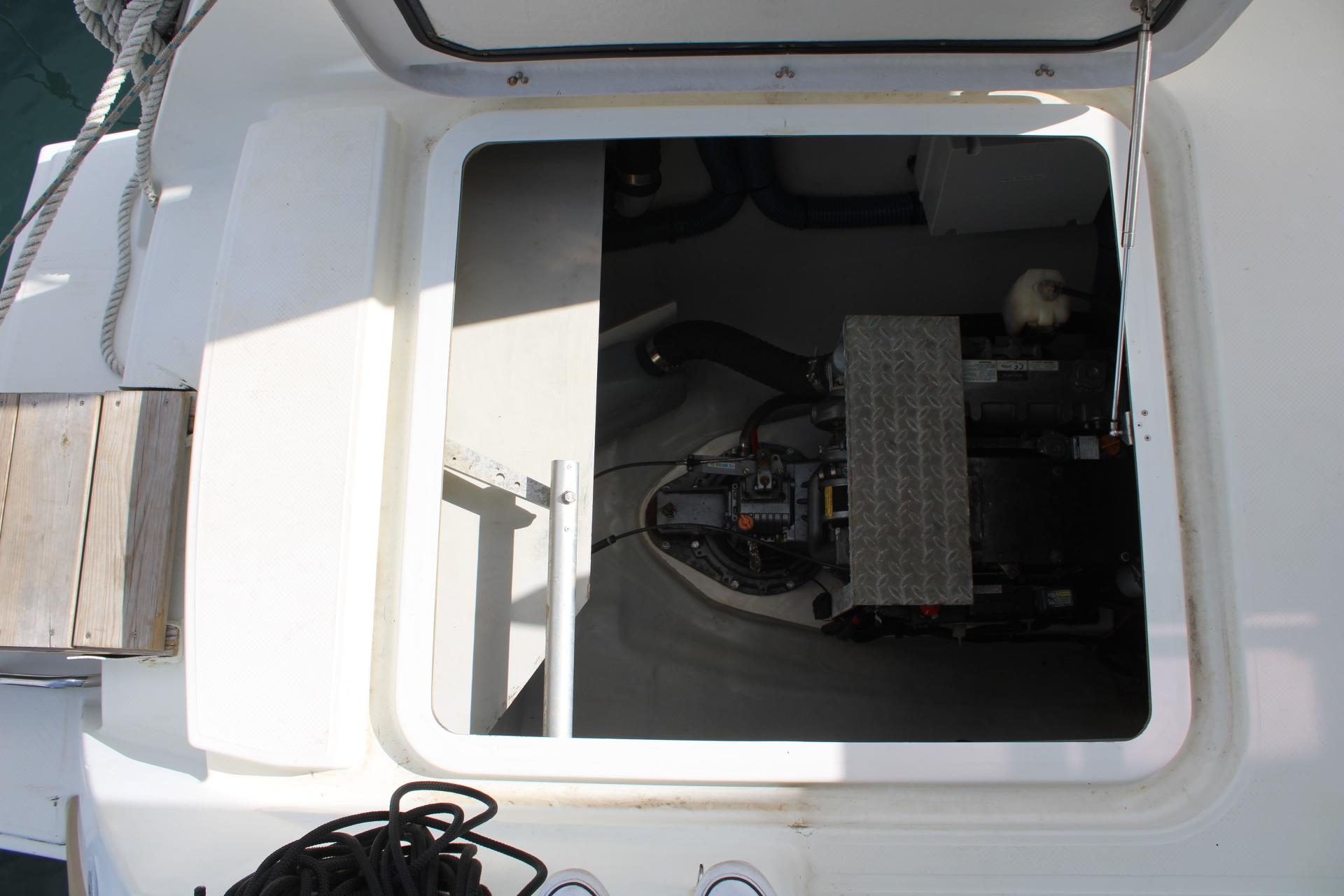 Engine compartment of 2017 Fountaine Pajot SABA 50 catamaran, open hatch view.