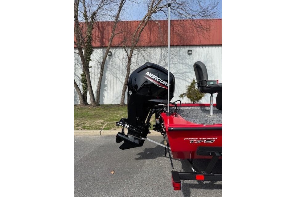 2026 Tracker Pro Team 175 boat with Mercury outboard motor, parked outdoors.