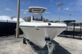 2023 Trophy T24 CC boat on trailer in outdoor lot.