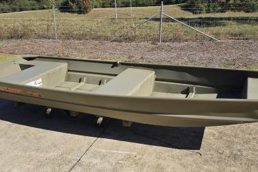 2026 Tracker Grizzly 14 Jon boat on concrete, outdoors.