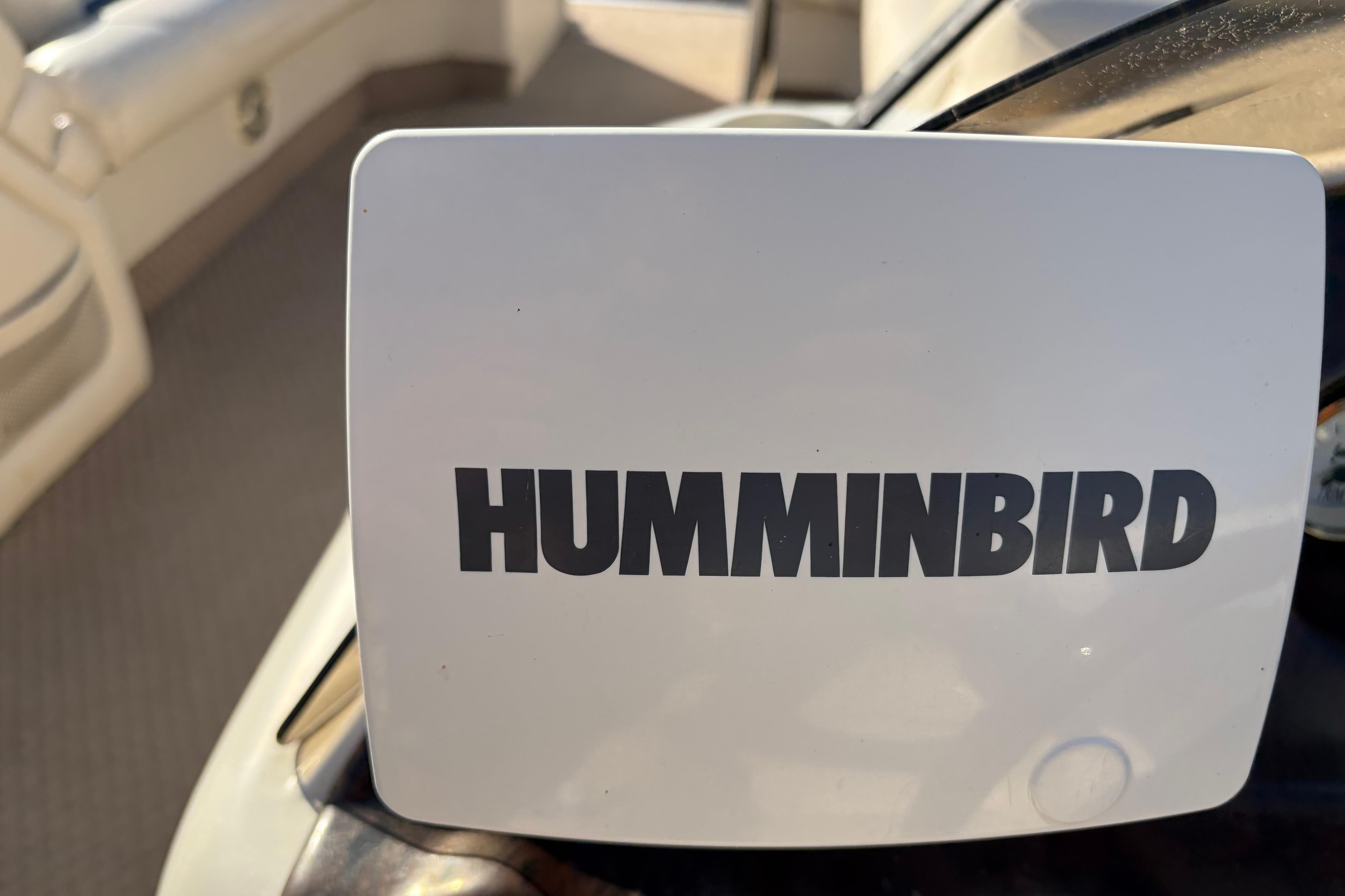 Humminbird device on 2003 Bennington 2250RSi boat dashboard.
