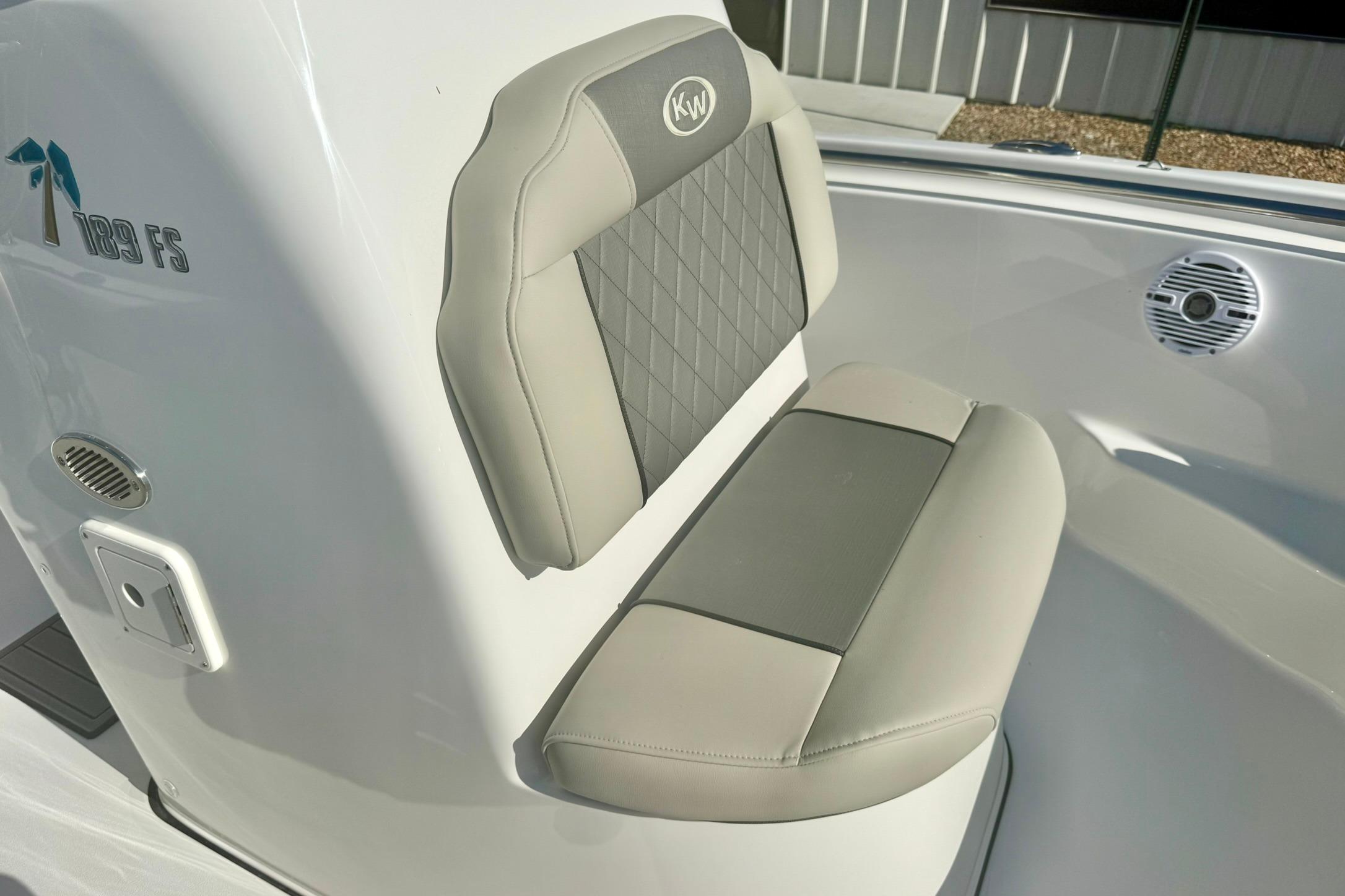 2026 Key West 189 FS boat seat with gray upholstery and logo detail.