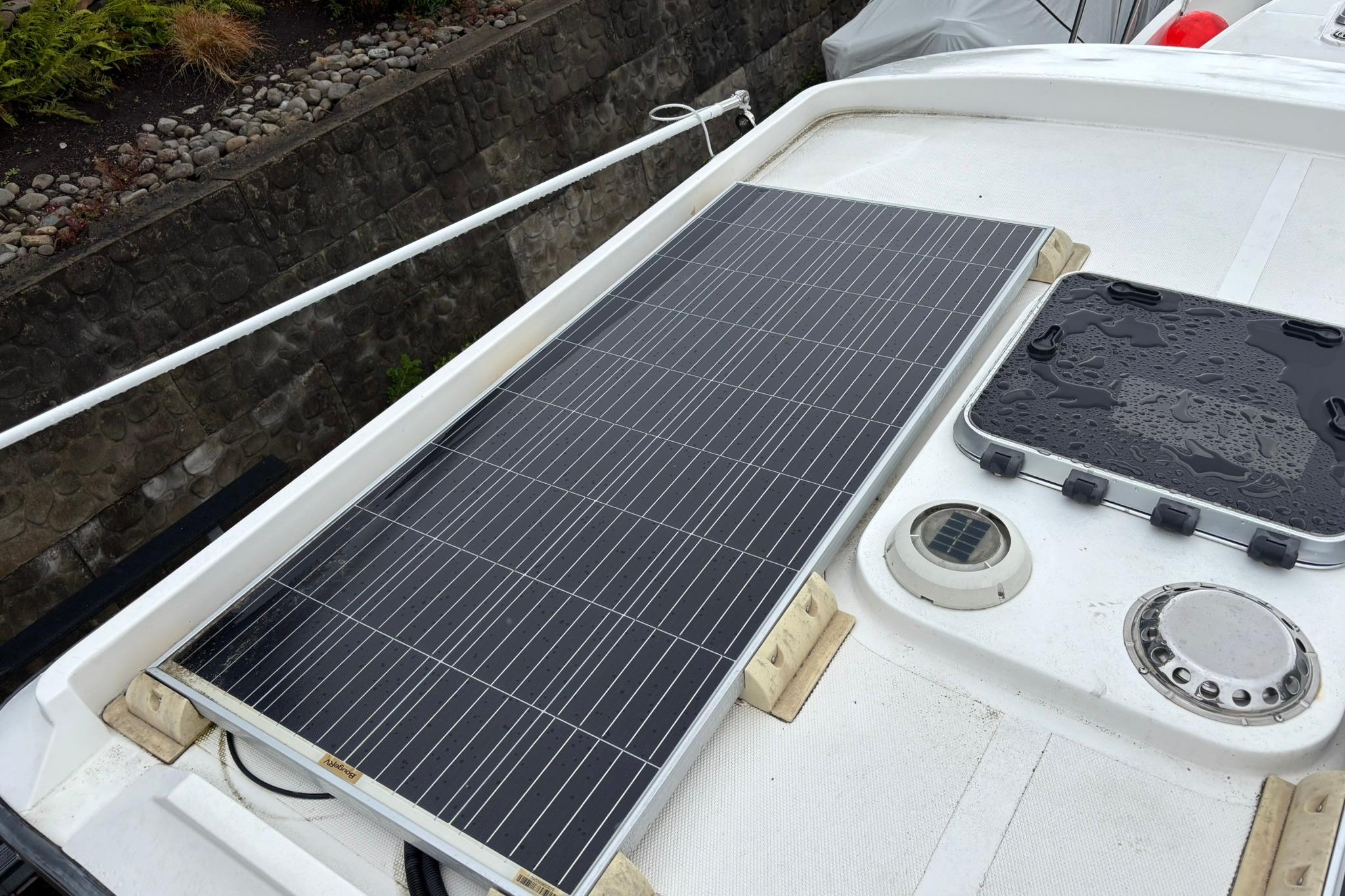 Solar panel on 2020 SeaPiper 35 boat deck, near hatch and ventilation system.