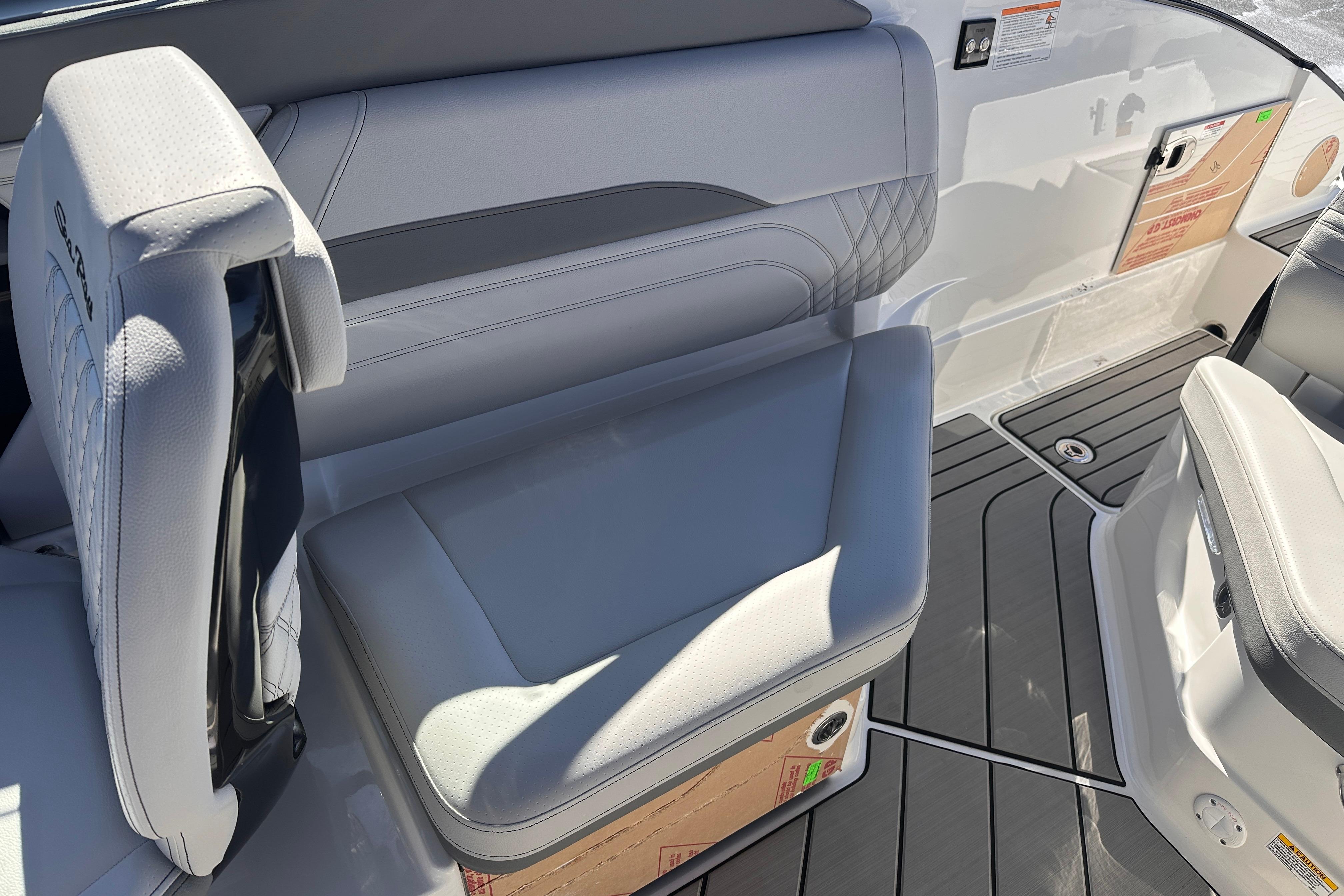 Luxurious seating on 2026 Sea Ray SLX 260 Outboard boat with sleek design.