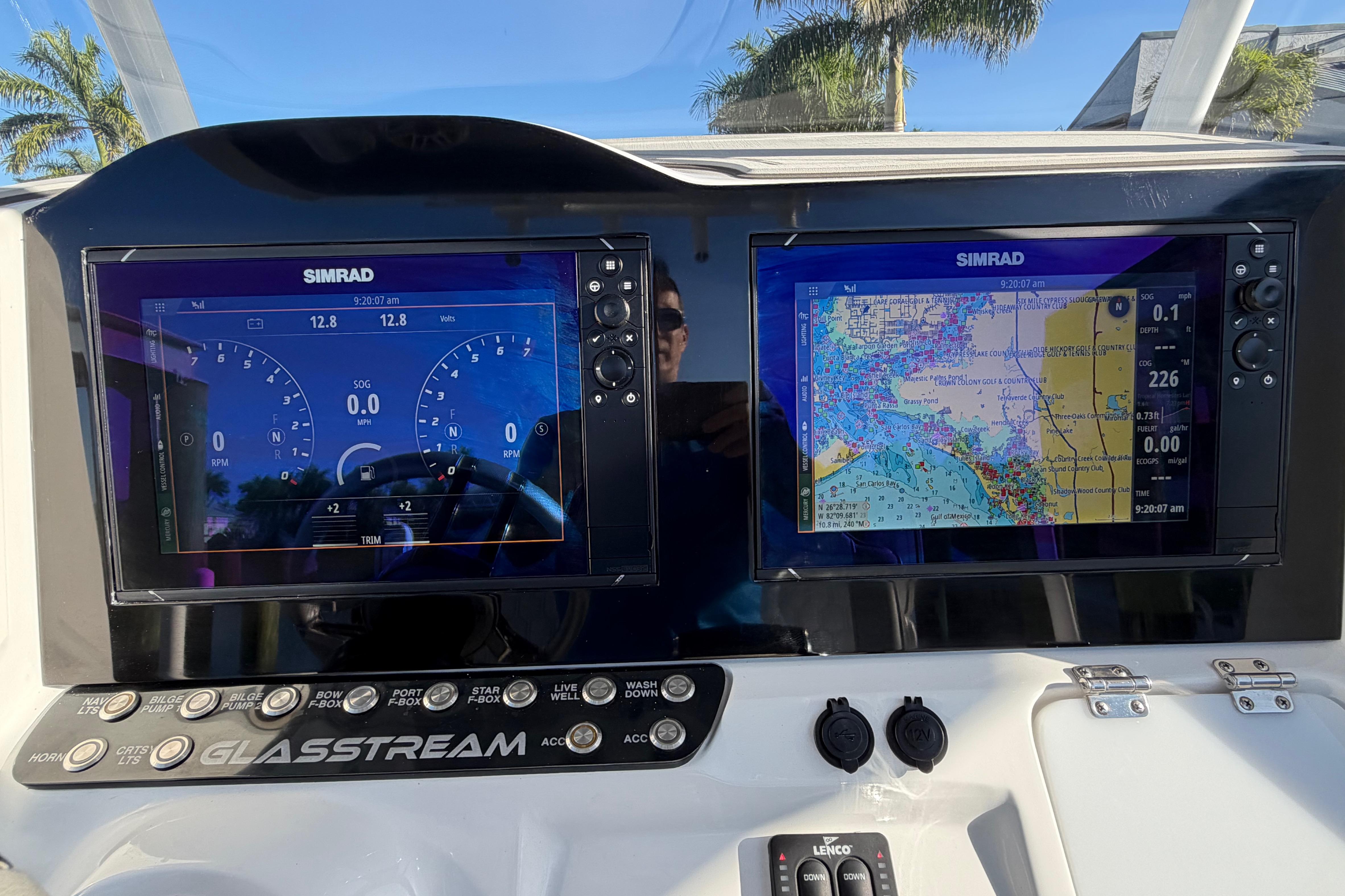 2022 Glasstream 328 Pro-XS dashboard with dual Simrad displays and navigation controls.