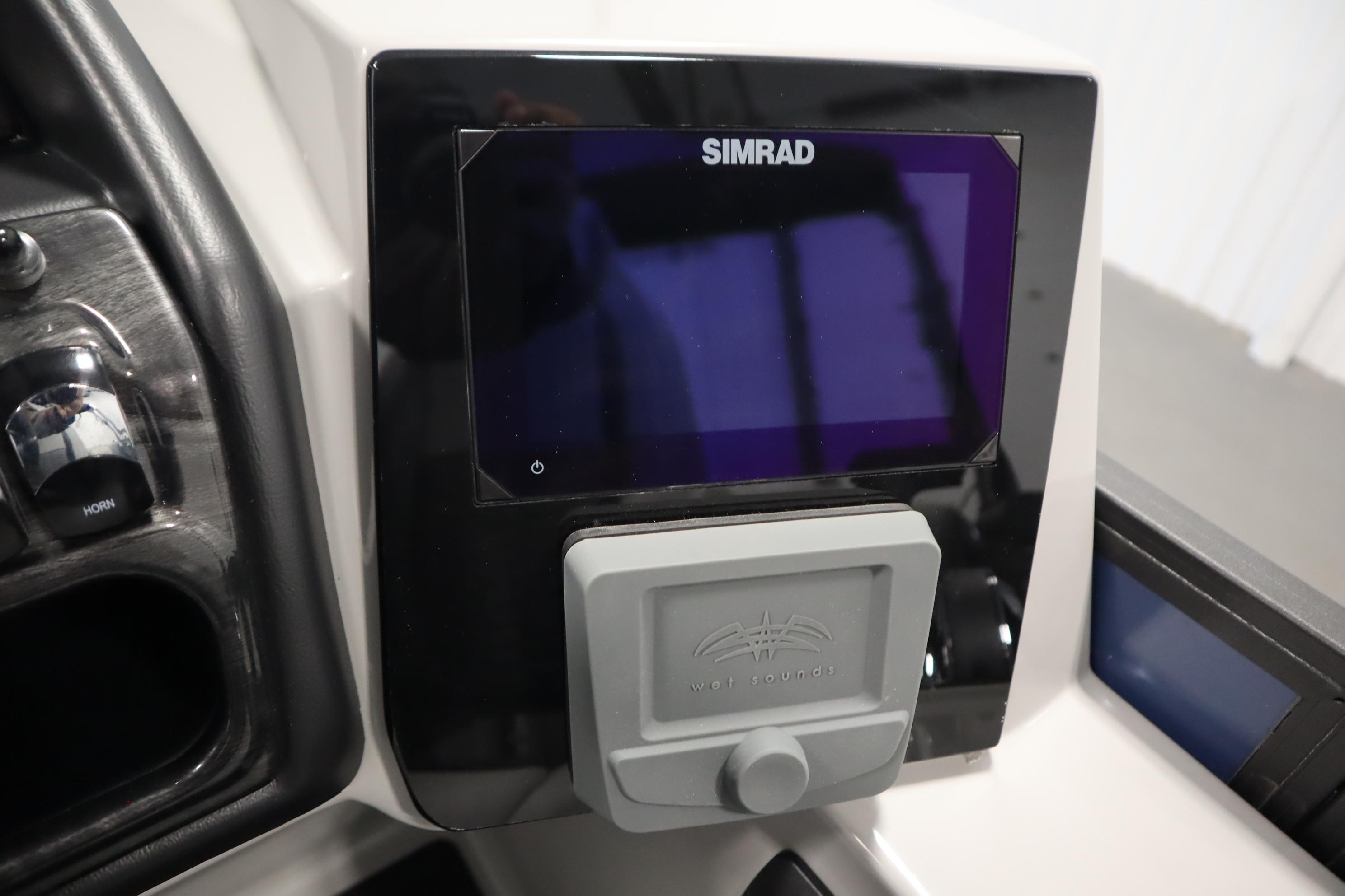 2025 Bentley Pontoons Elite 253 Admiral Tri-toon dashboard with Simrad display and controls.