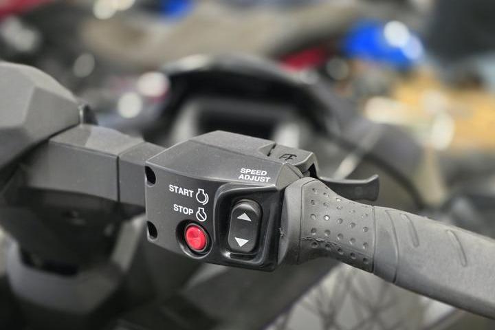 Close-up of 2026 Yamaha WaveRunner GP HO handlebar controls with start, stop, and speed adjust buttons.