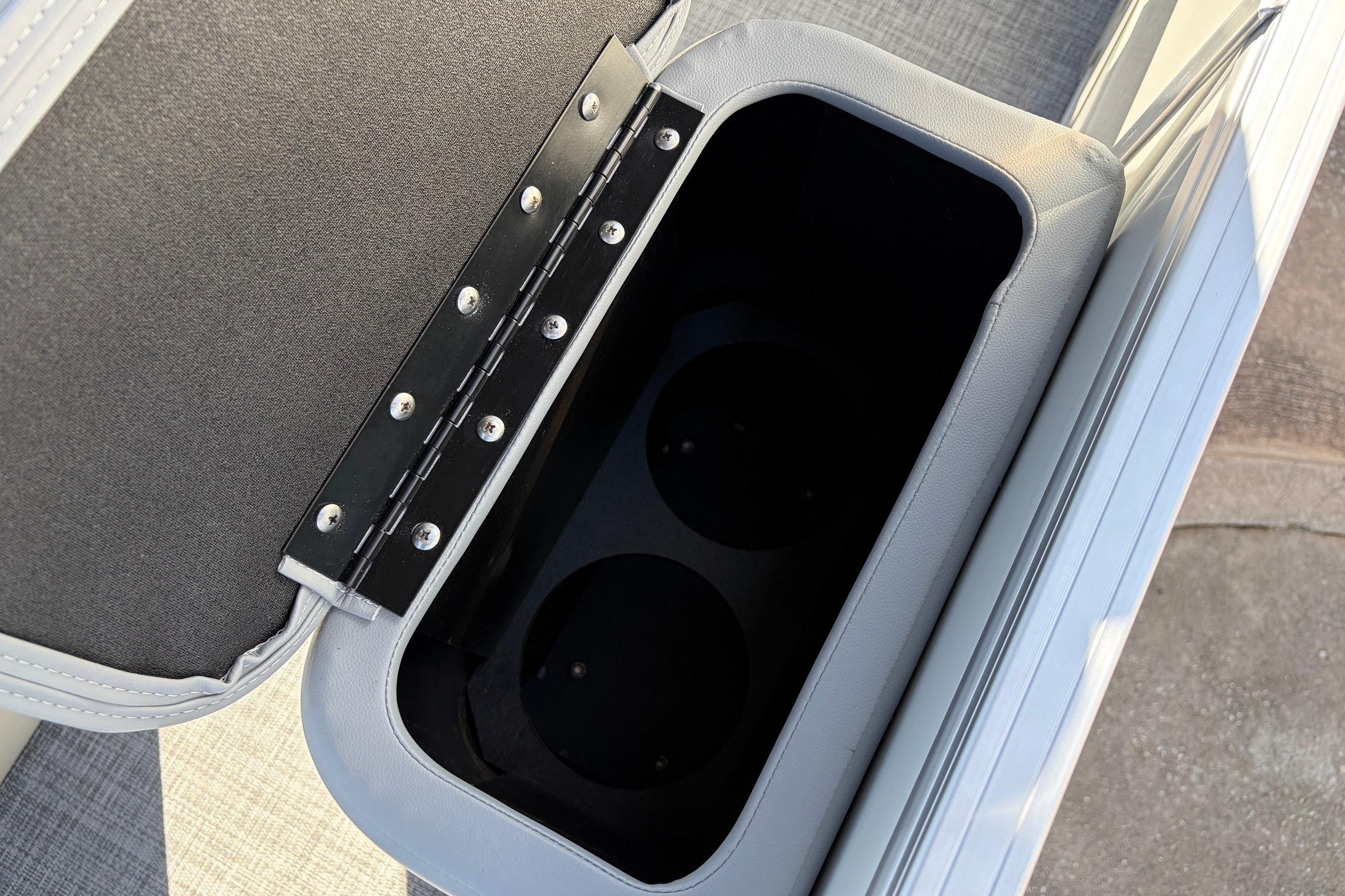 Storage compartment in 2026 Sun Tracker Party Barge 22 RF XP3 boat.