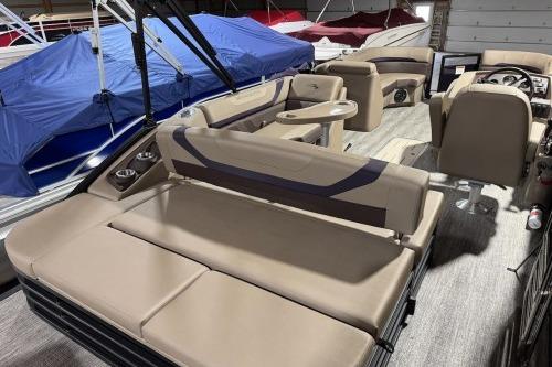 2026 Bennington 22SXSB pontoon boat interior with beige seating and modern design.