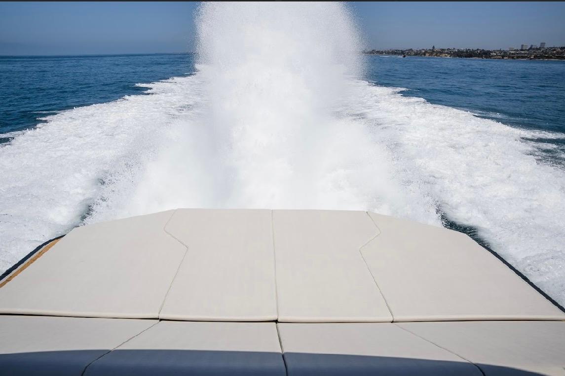 2025 Maori 54ft XL yacht cruising, leaving a foamy wake in the ocean.