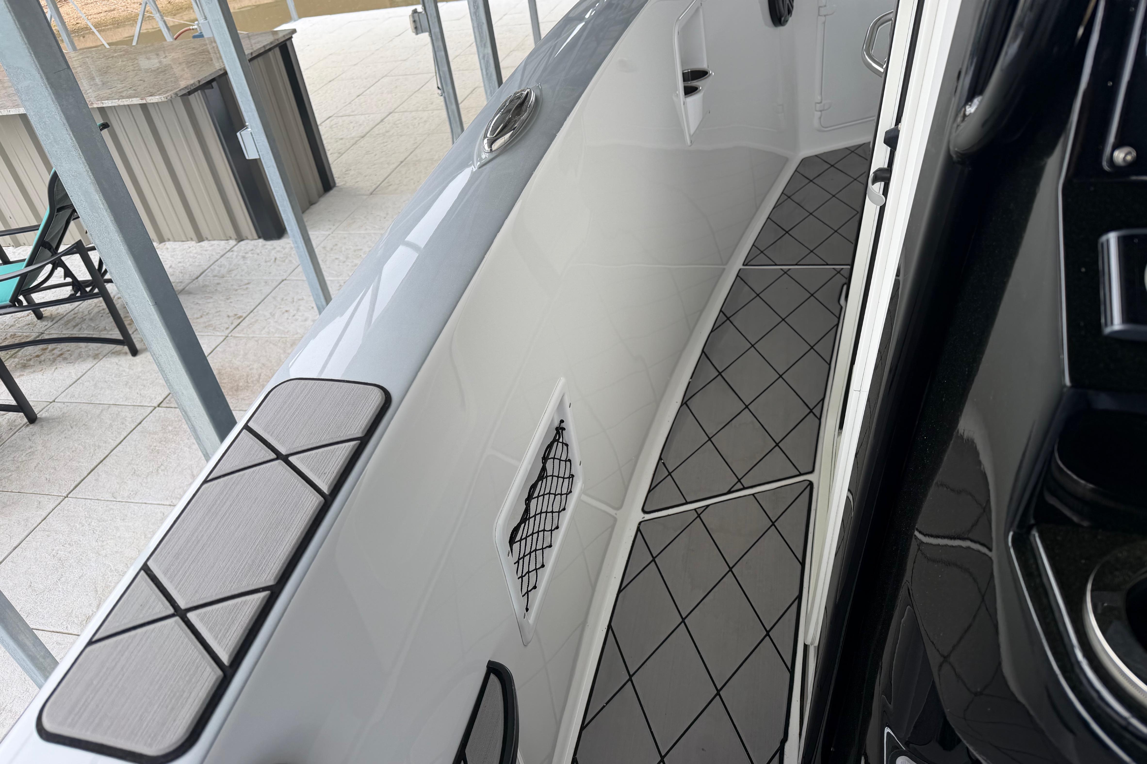 2018 Sunsation 32 CCX boat interior with sleek design and modern flooring.