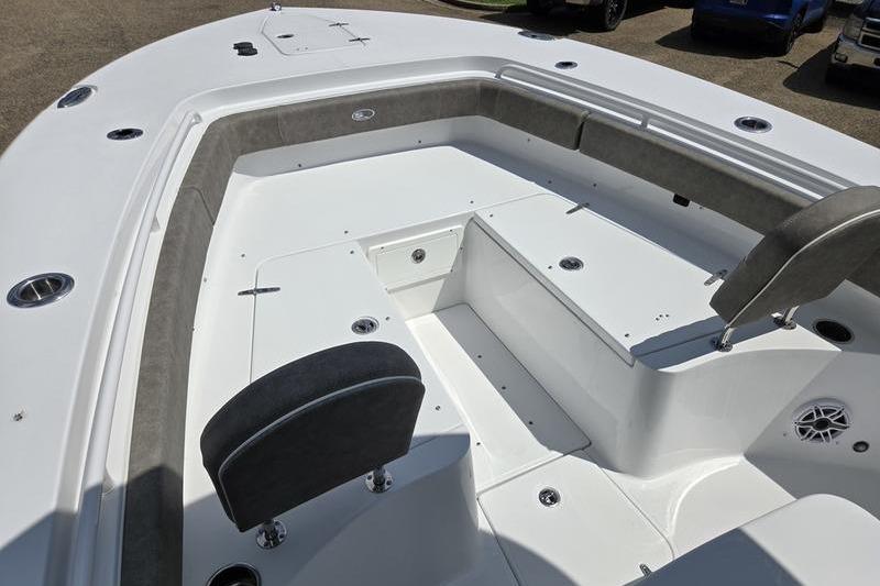 2027 Sea Hunt Ultra 275 SE boat interior with seating and storage compartments.