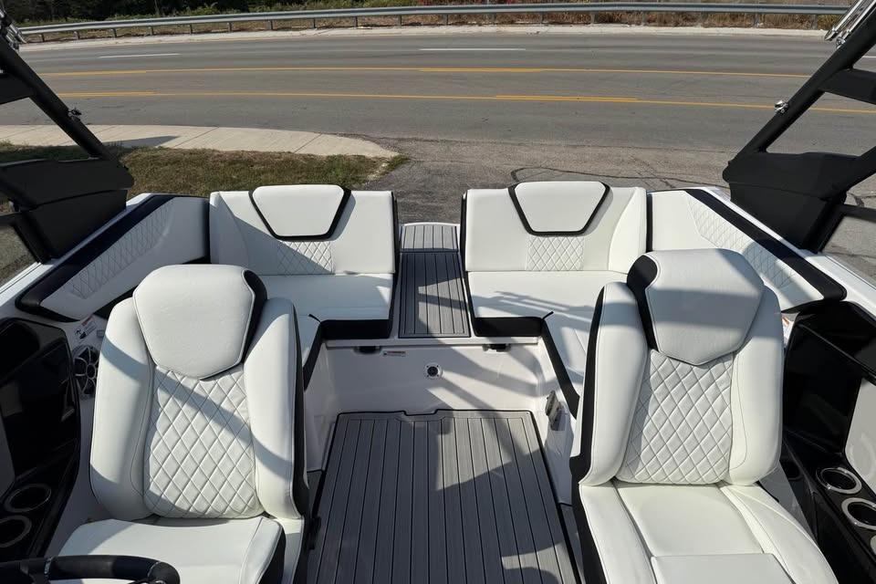 2026 Yamaha Boats 222S interior with white quilted seating and modern design.