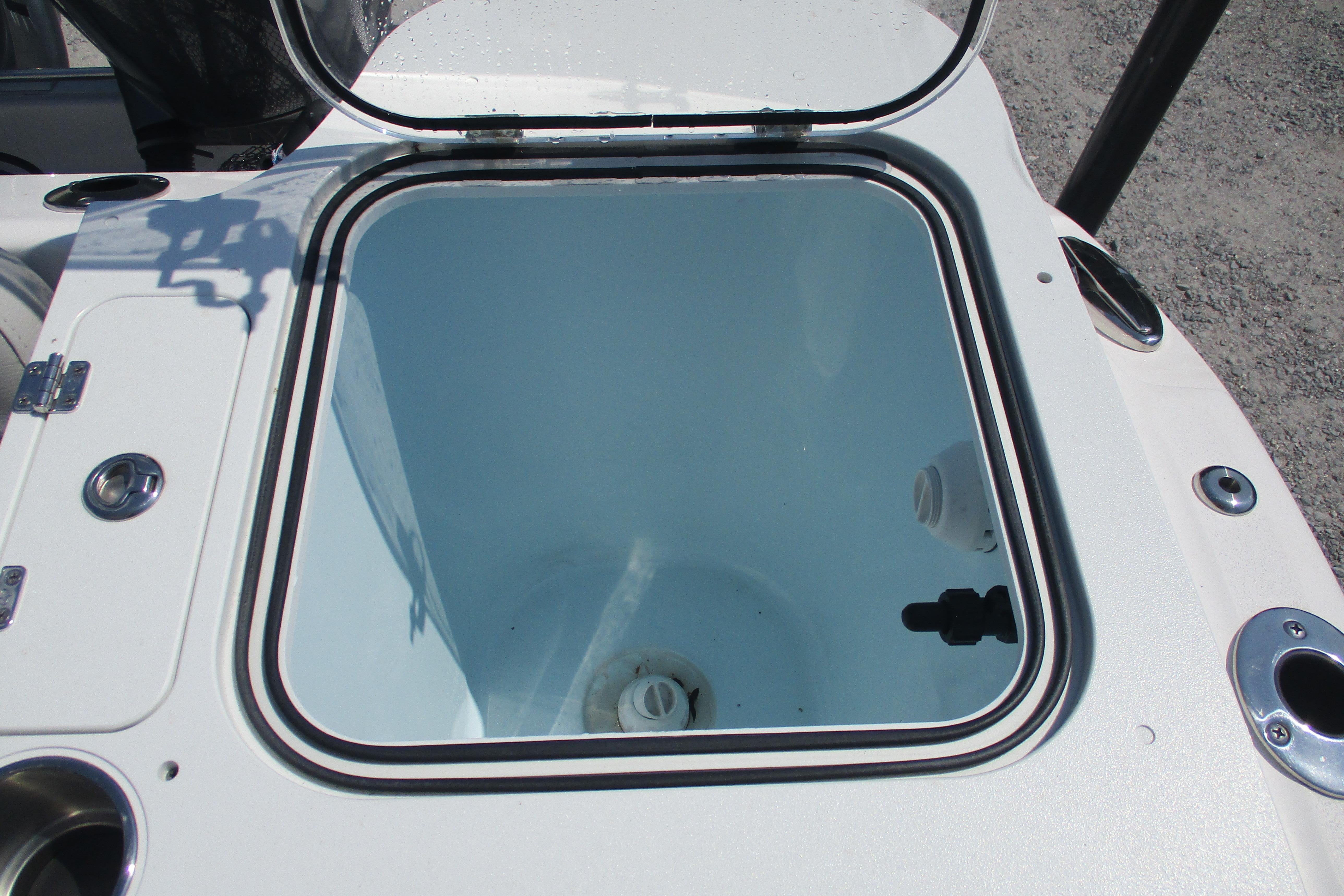 2024 Sea Fox 268 Commander livewell, open lid, white interior, marine hardware.