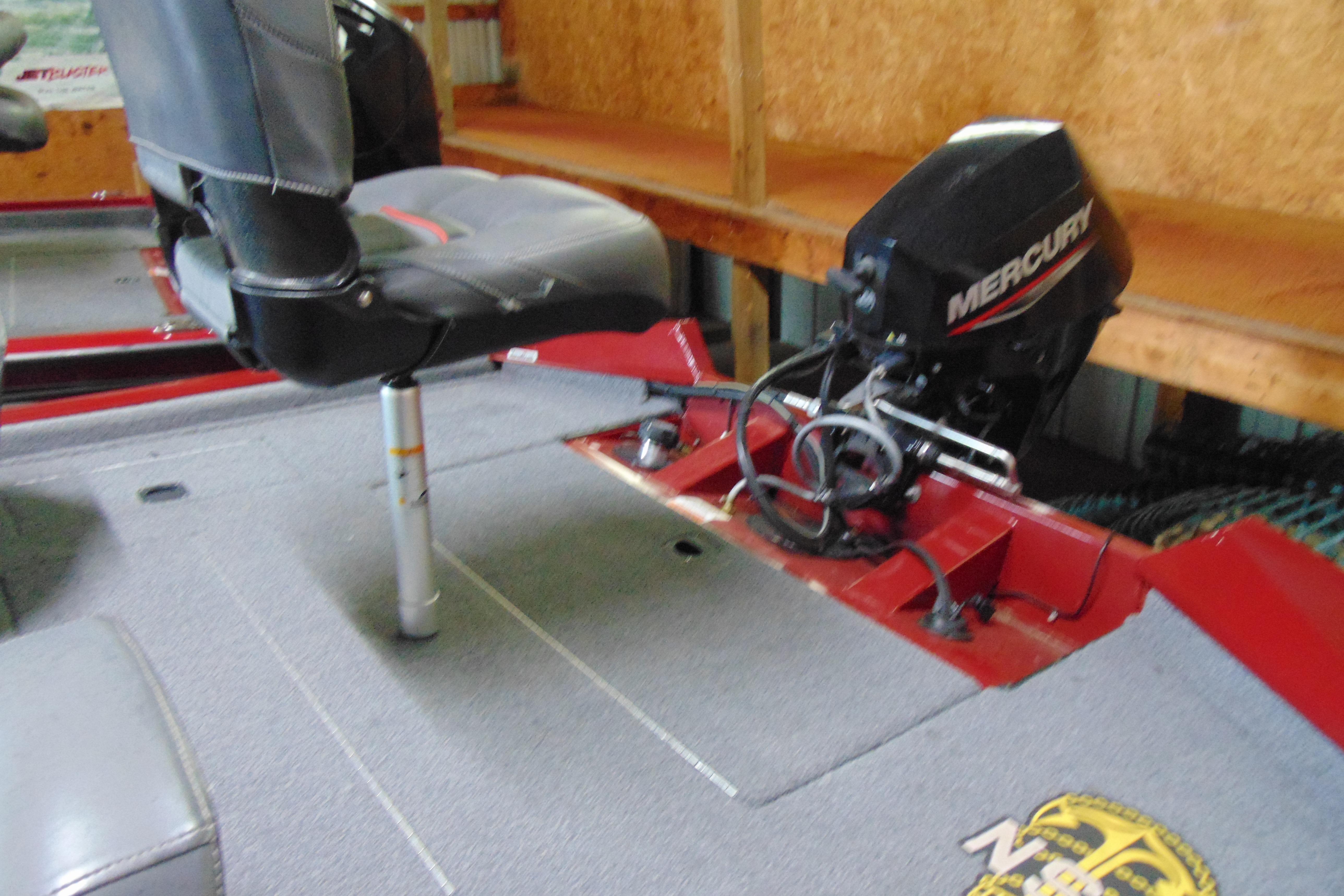 2022 Bass Tracker Pro 17 boat interior with Mercury engine and seating.