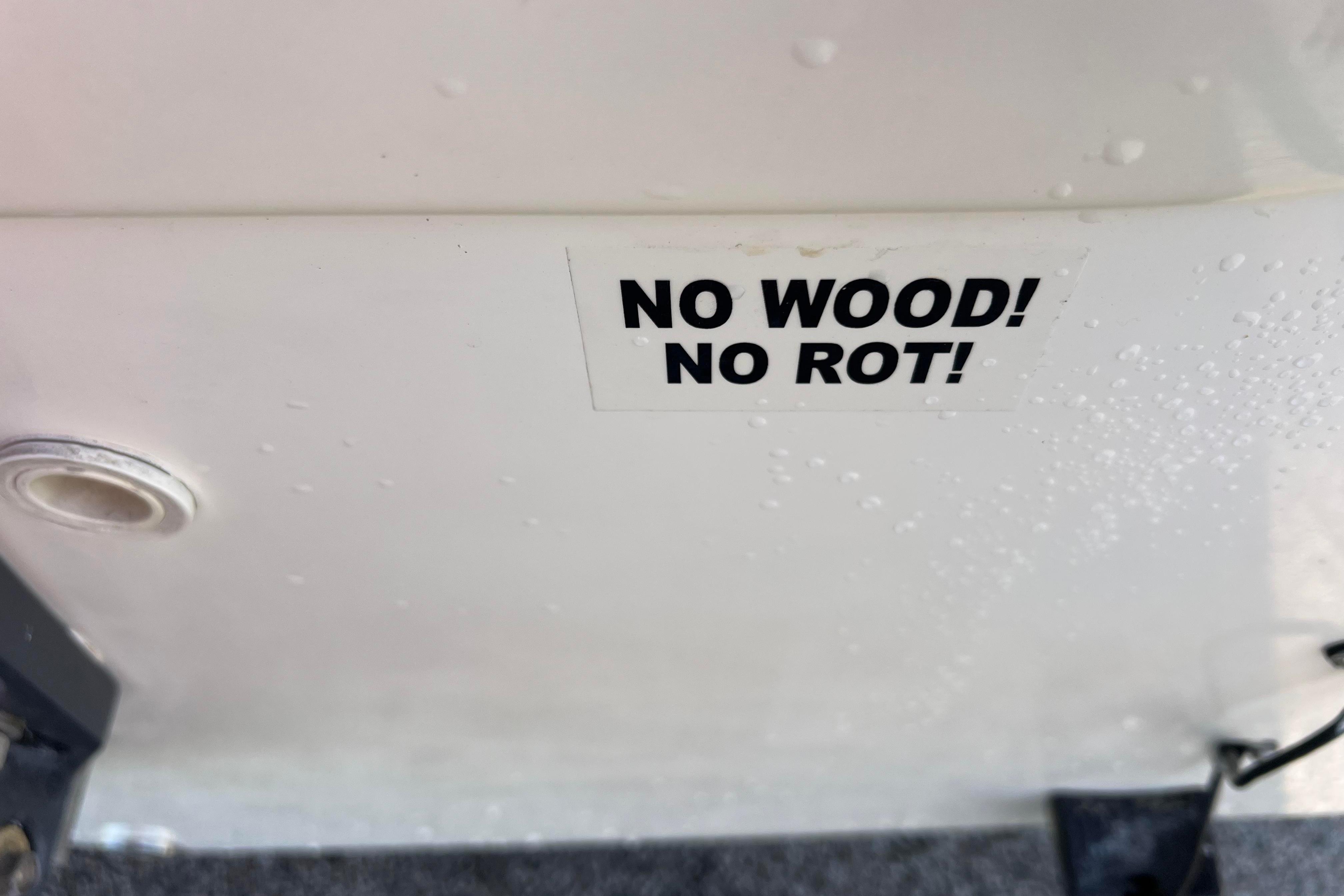 2012 Sea Fox 206 Center Console boat with "No Wood! No Rot!" sticker.