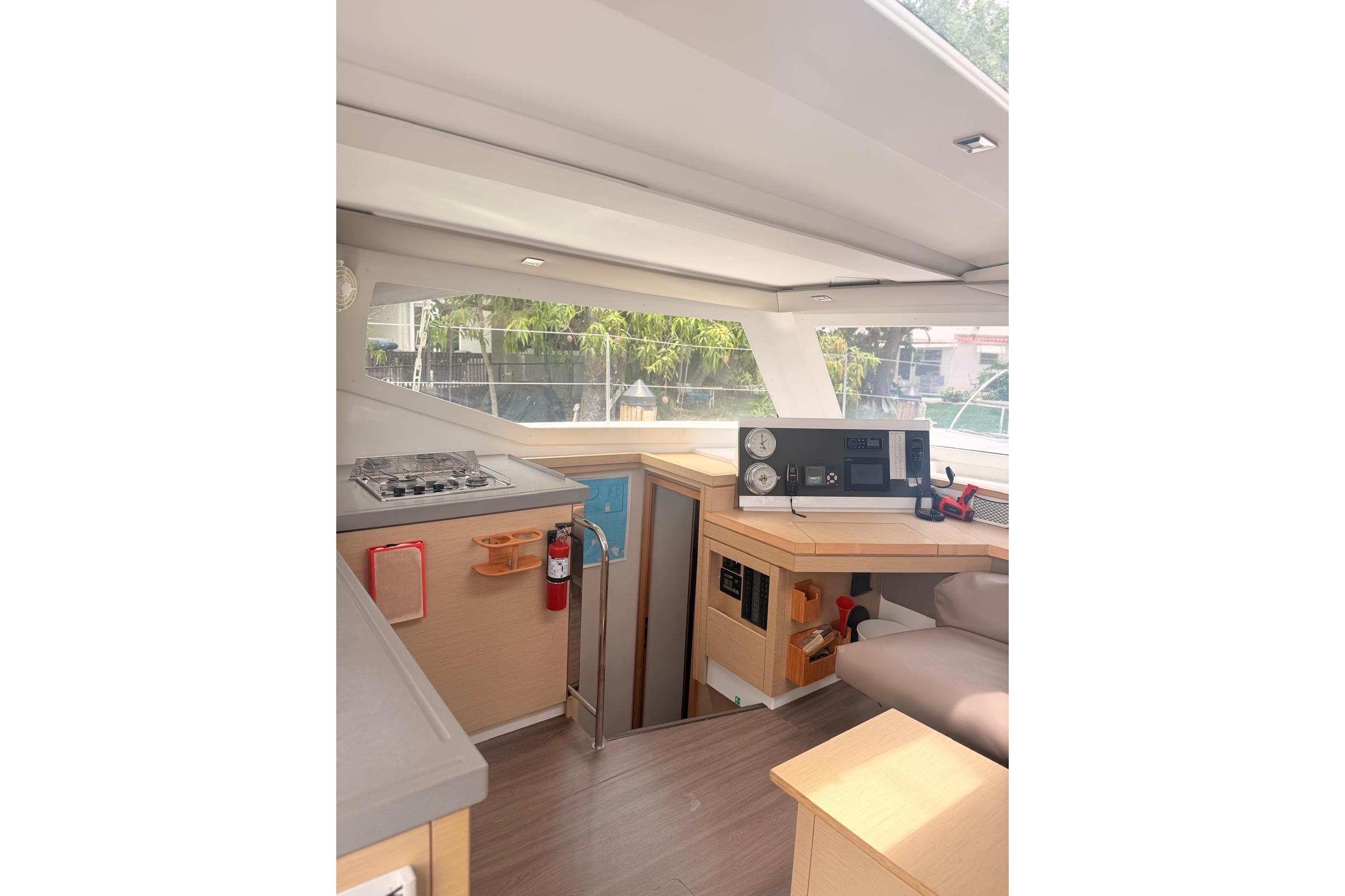 Interior of 2018 Fountaine Pajot Lucia 40 catamaran with modern navigation equipment.