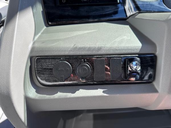 Dashboard controls of 2025 Tahoe Pontoon 2585 LTZ Entertainer boat.