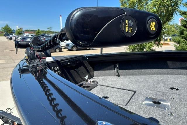 2026 Ranger VX1888 WT boat with trolling motor, parked outdoors on a sunny day.