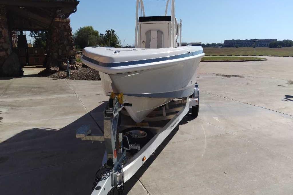 2026 Ranger 2600 Bay boat on trailer in sunny outdoor setting.