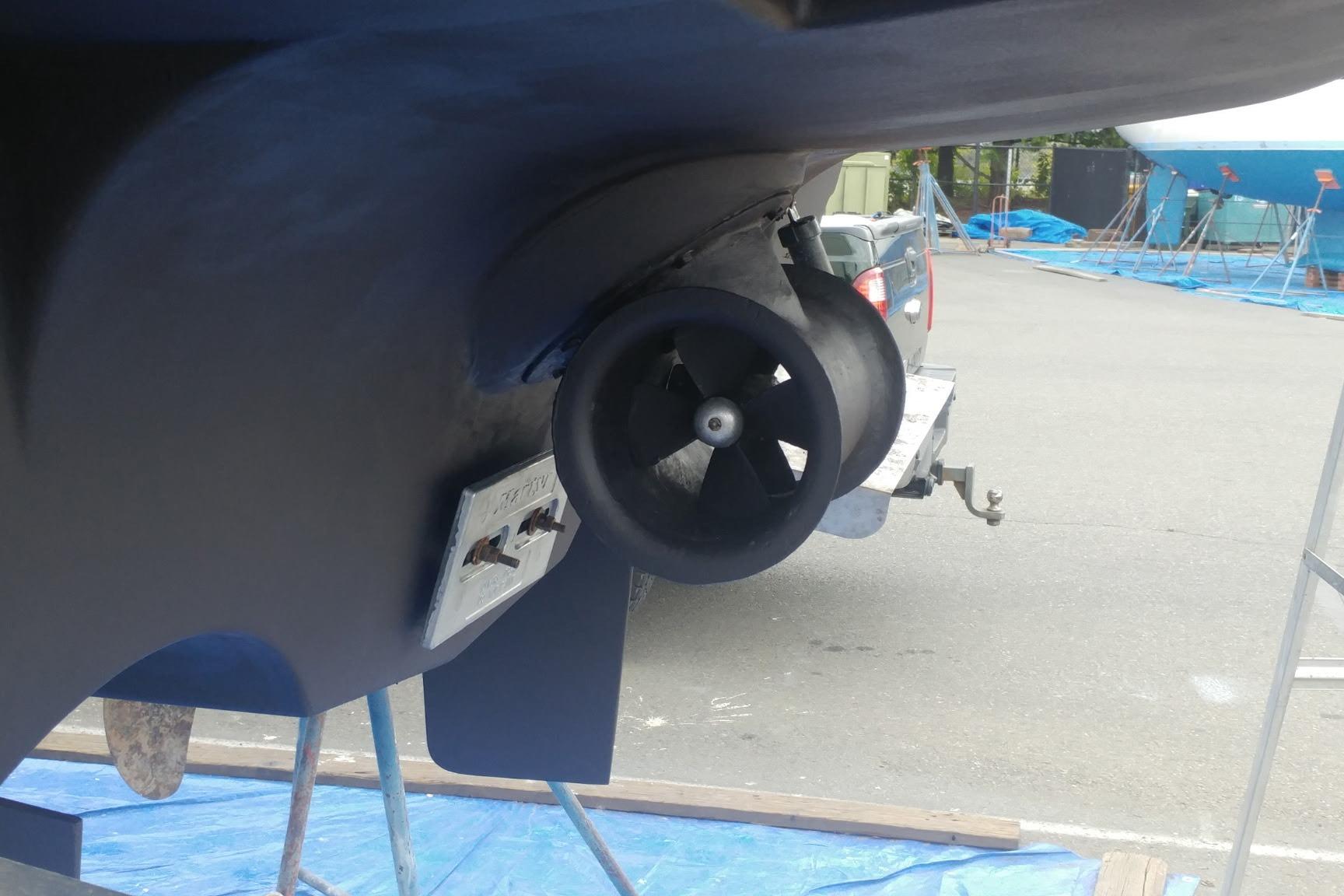 2001 Bayliner 3488 Command Bridge Motoryacht propeller and hull detail in a boatyard.