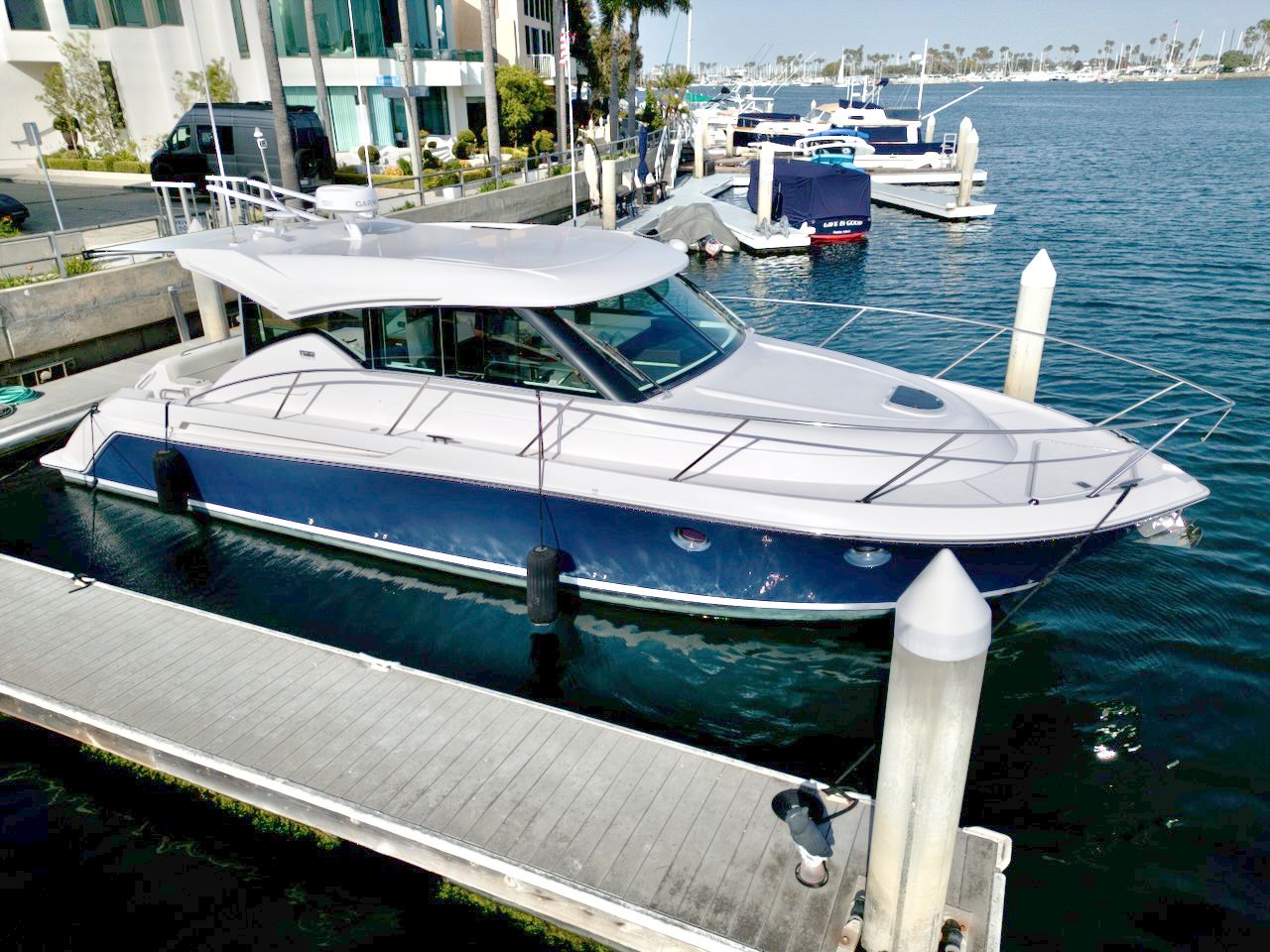 2019 Tiara Yachts Coupe 39 at dock, modern design.